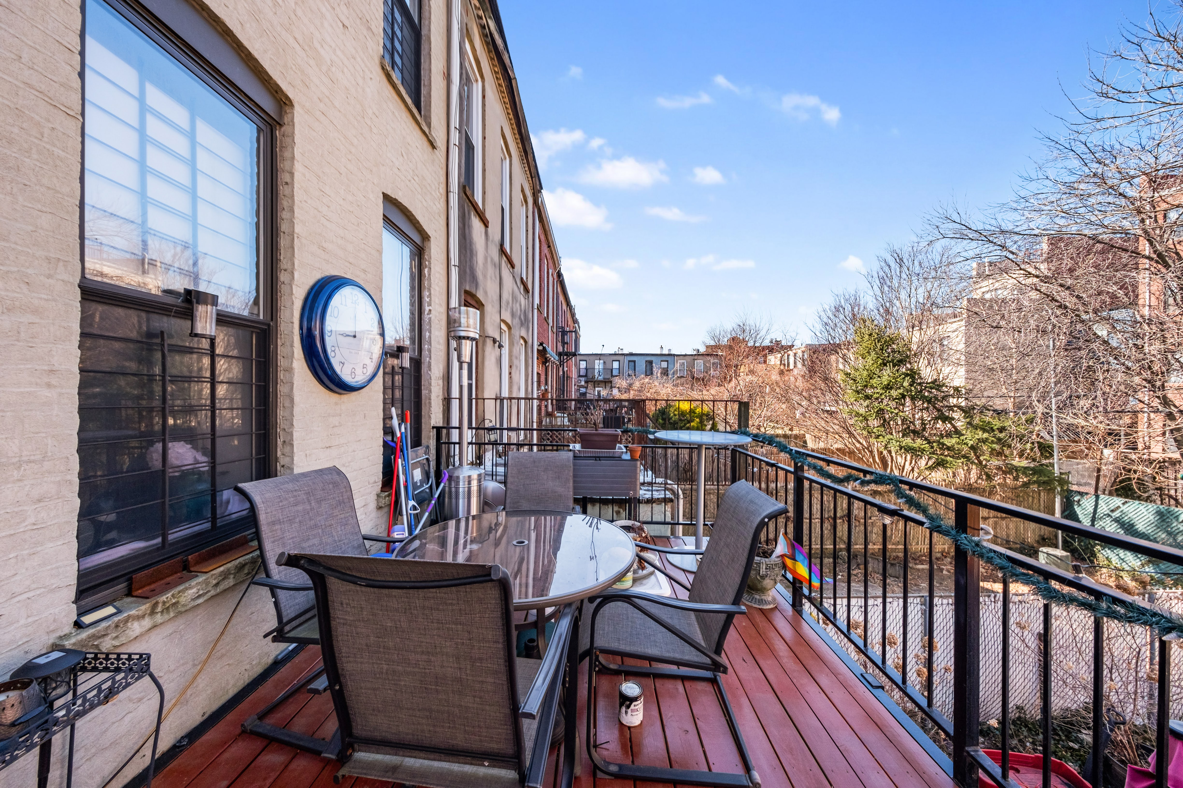 275 Van Buren Street Brooklyn, NY 11221 - Photo 25 of 33 a view of a chairs and table in the balcony