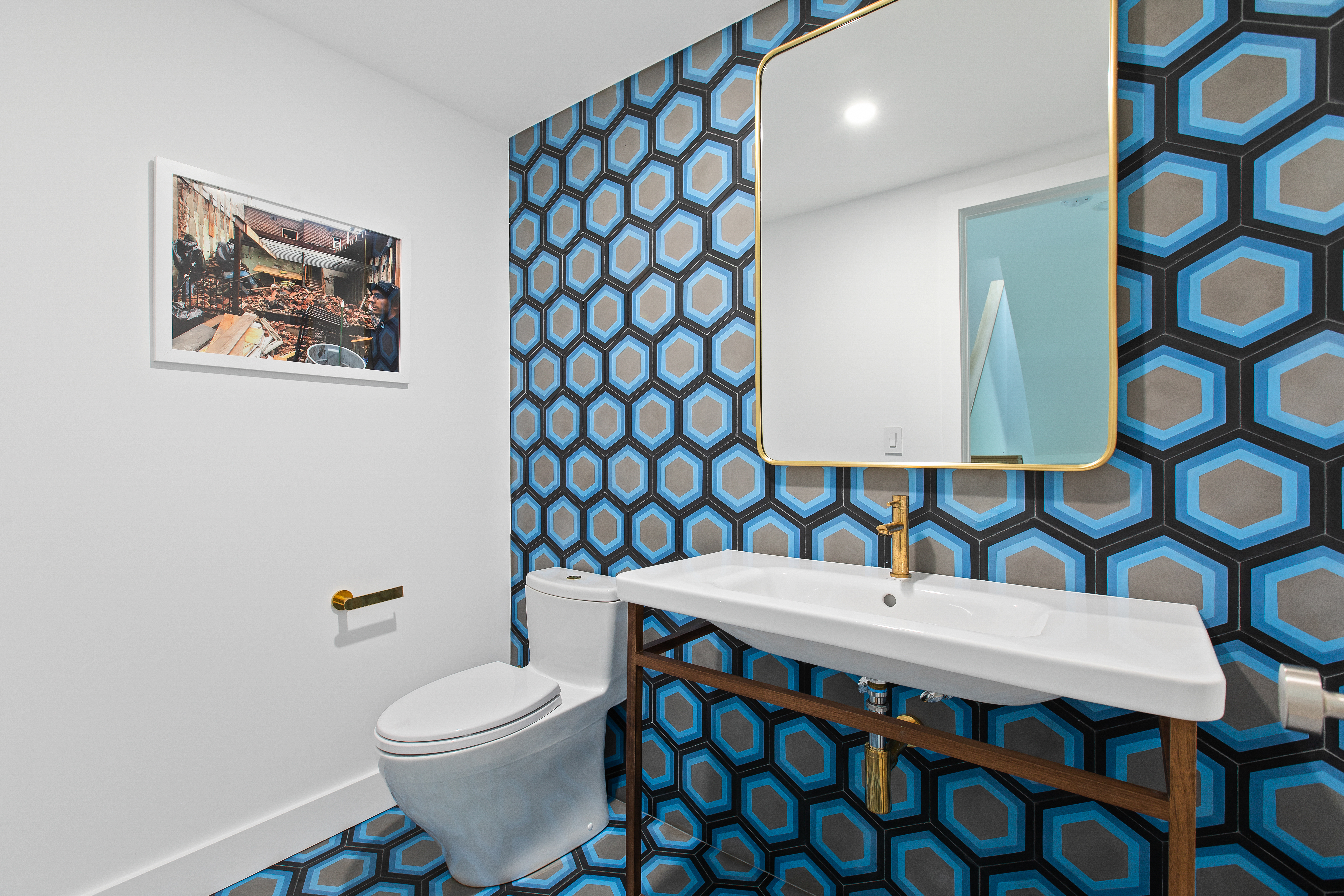 42 Sharon Street Brooklyn, NY 11211 - Photo 14 of 28 a bathroom with a sink a toilet and mirror