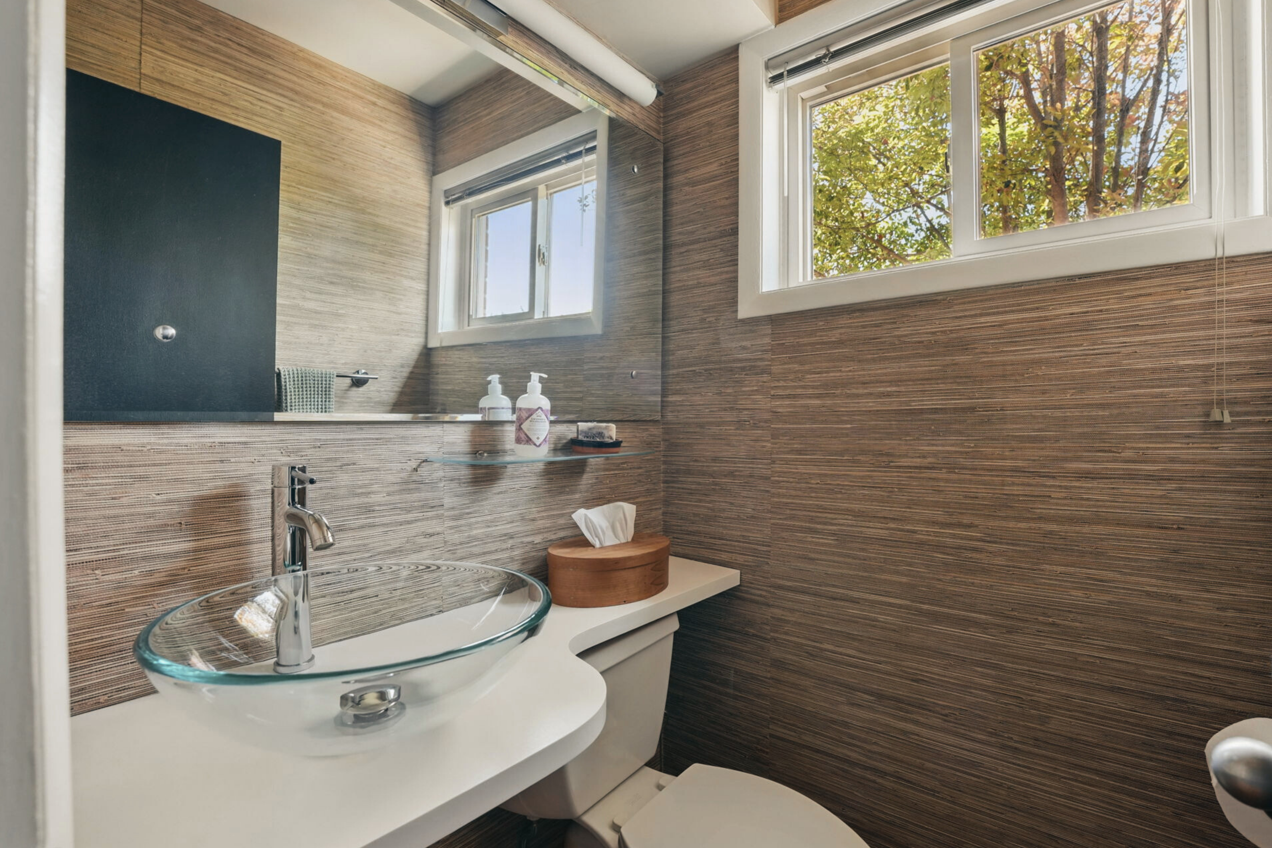 8003 16th Street Northwest Washington, DC 20012 - Photo 10 of 38 a bathroom with a toilet a sink and mirror
