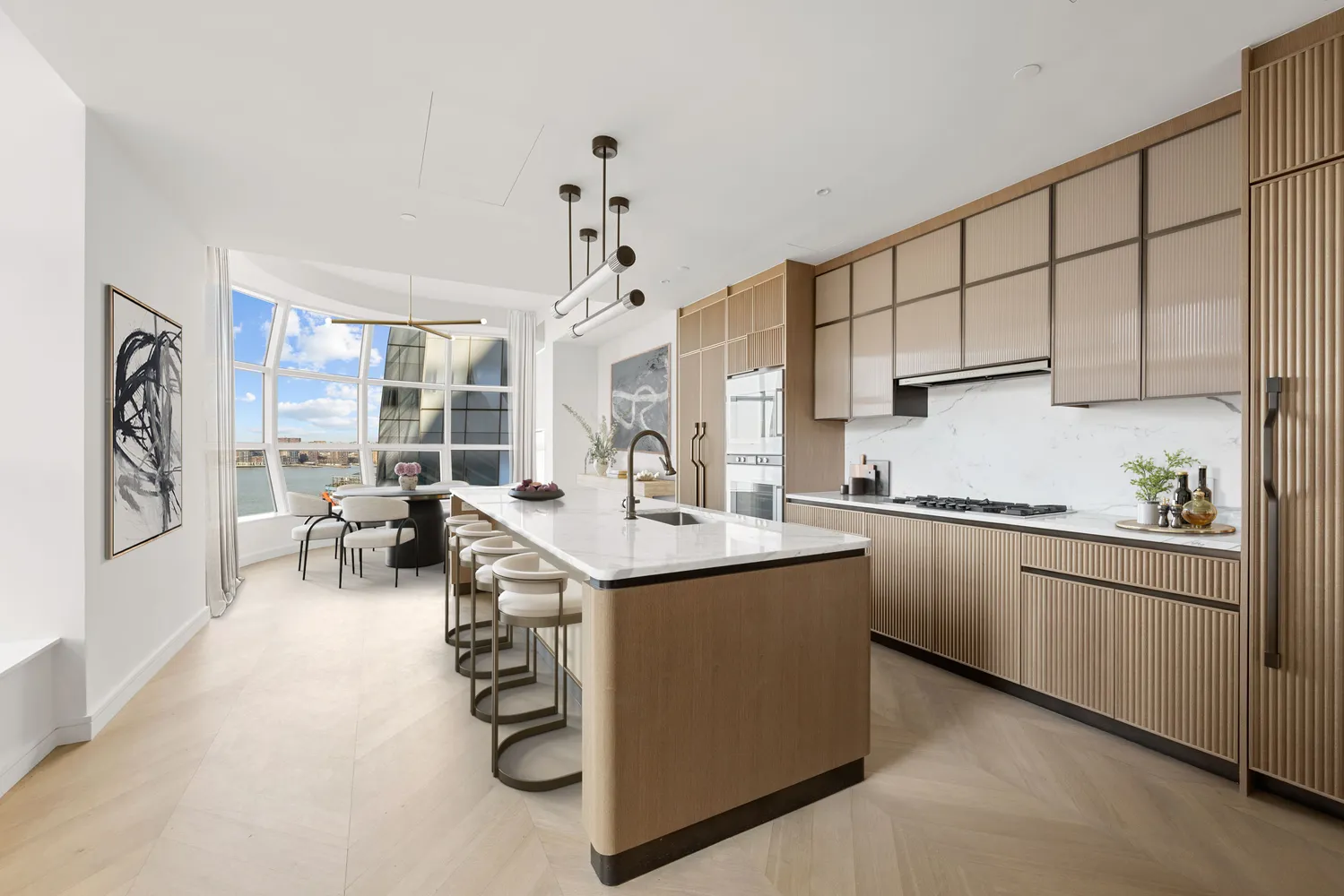 a kitchen with stainless steel appliances granite countertop a sink and cabinets