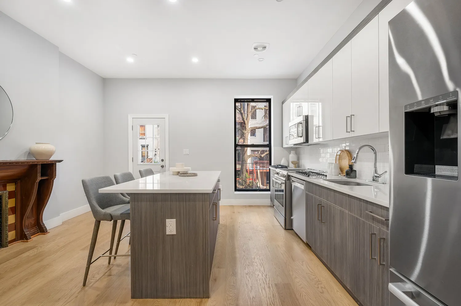 a kitchen with counter top space and appliances