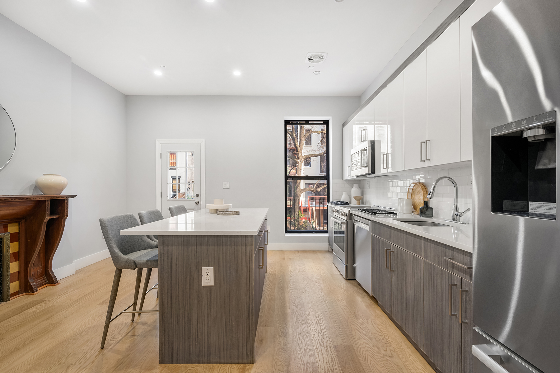 307 West 136th Street Manhattan, NY 10030 - Photo 5 of 26 a kitchen with counter top space and appliances