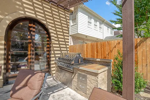 a view of roof deck with couch