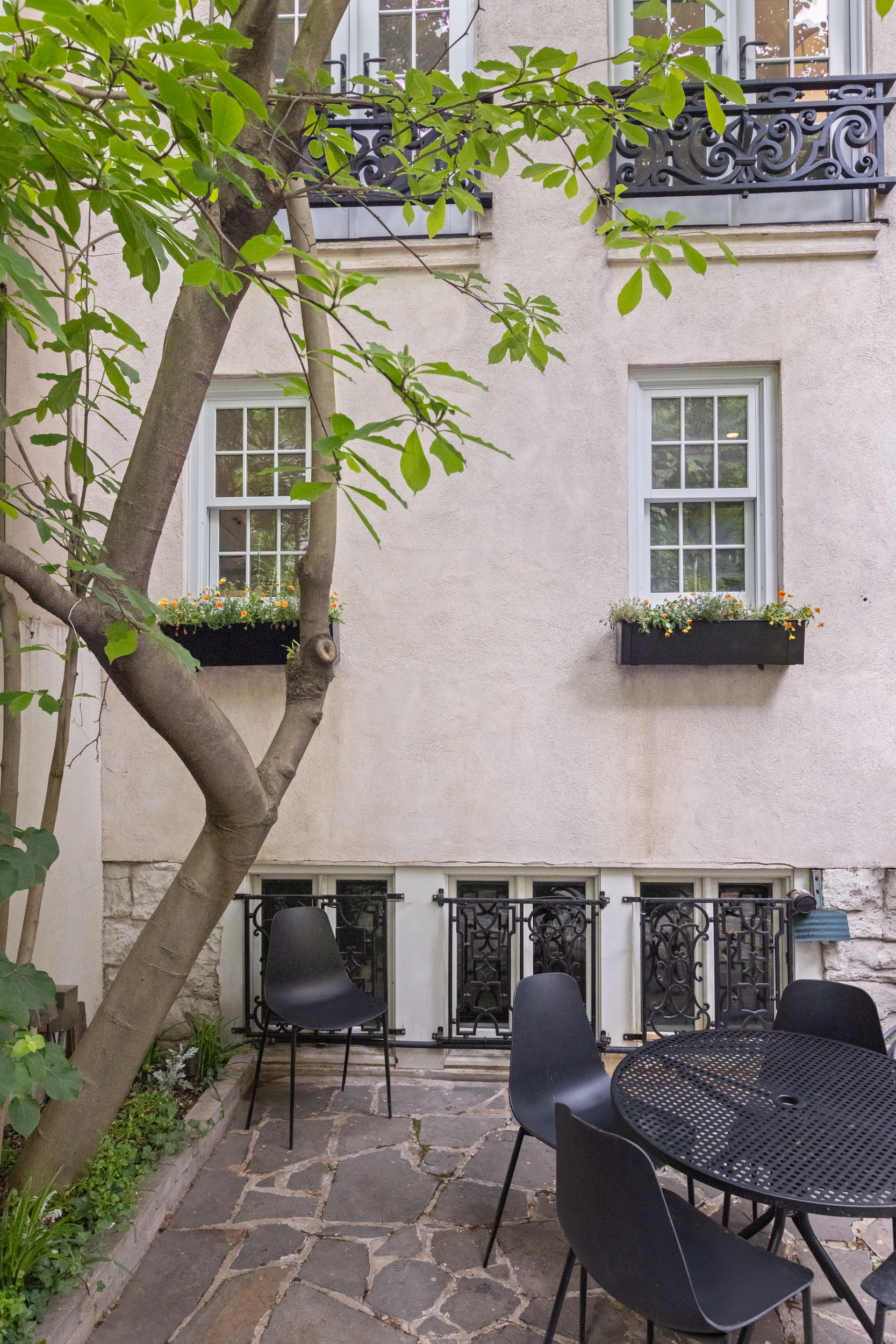 49 Barrow Street Manhattan, NY 10014 - Photo 13 of 25 an aerial view of a house with swimming pool and outdoor seating