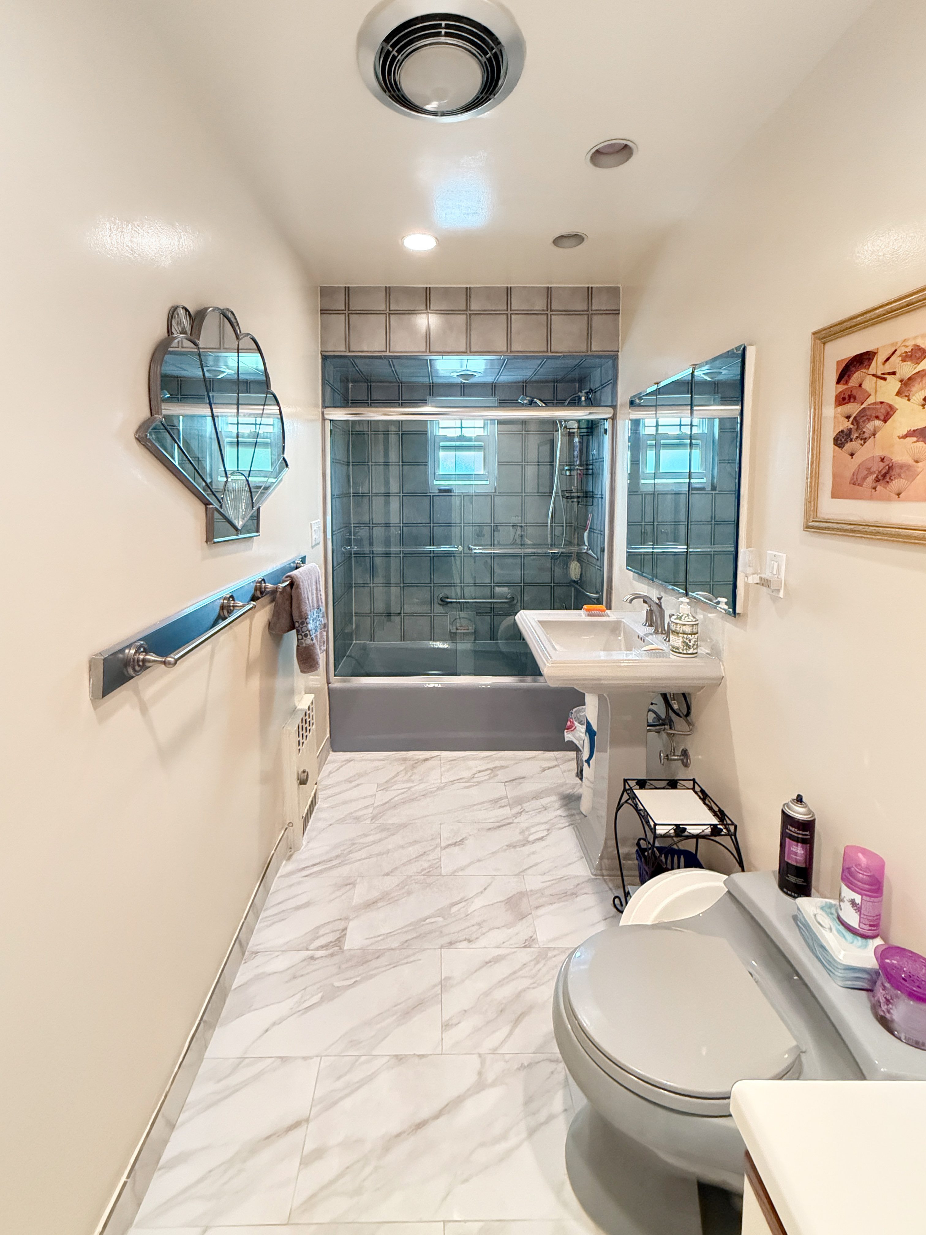 3829 Beach 38th Street Brooklyn, NY 11224 - Photo 14 of 31 a bathroom with a sink toilet and a shower