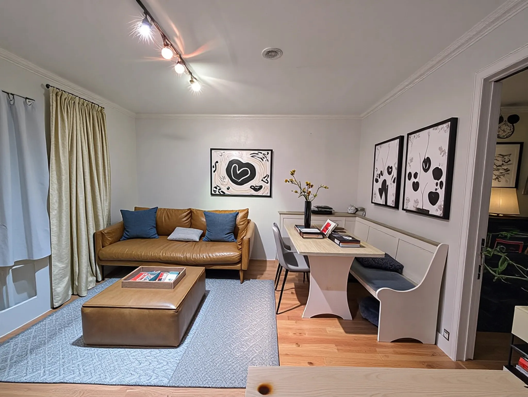 49 Saint Marks Avenue, Unit 1 Brooklyn, NY 11217 - Photo 12 of 21 a living room with furniture and a painting on the wall