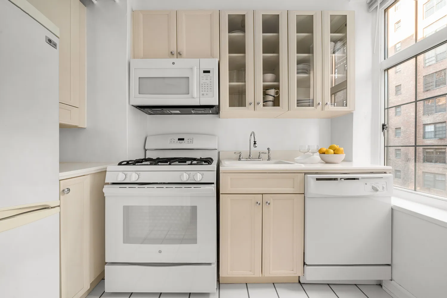 a utility room with closet dryer and washer