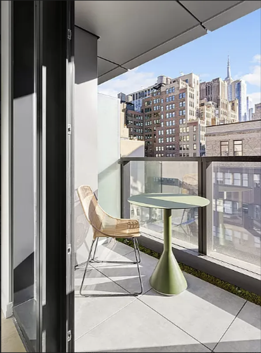 300 West 30th Street, Unit 4A Manhattan, NY 10001 - Photo 5 of 15 a room with table and chairs