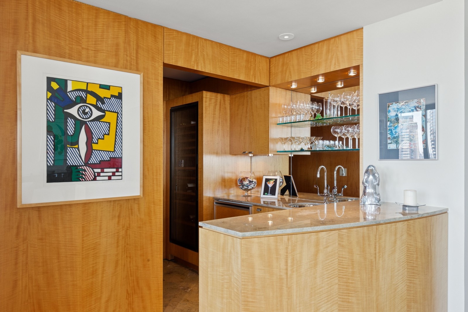 2 Columbus Avenue, Unit 35A Manhattan, NY 10023 - Photo 10 of 13 a room with table and painting