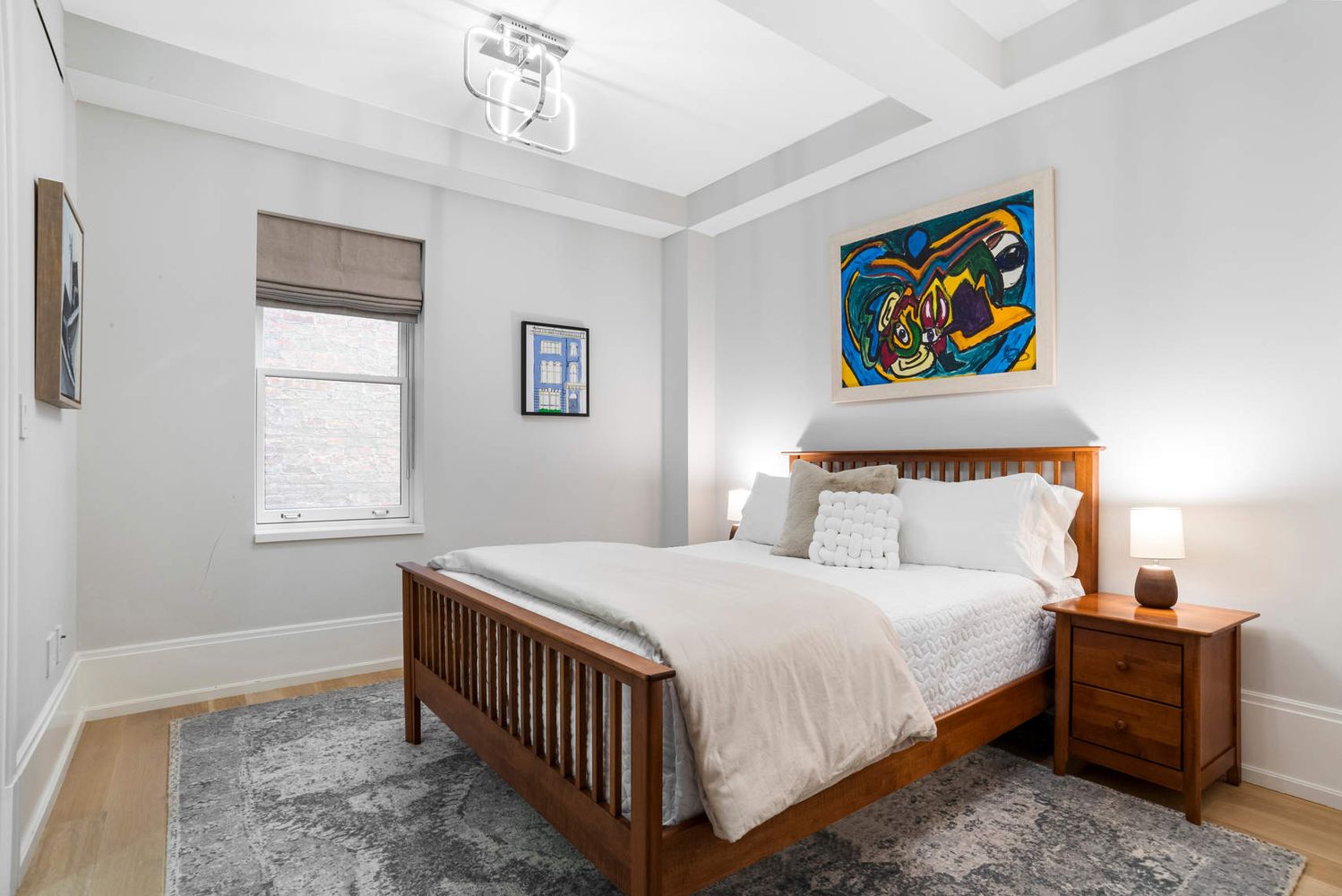 182 West 82nd Street, Unit 4E Manhattan, NY 10024 - Photo 17 of 25 a bedroom with a bed and a window