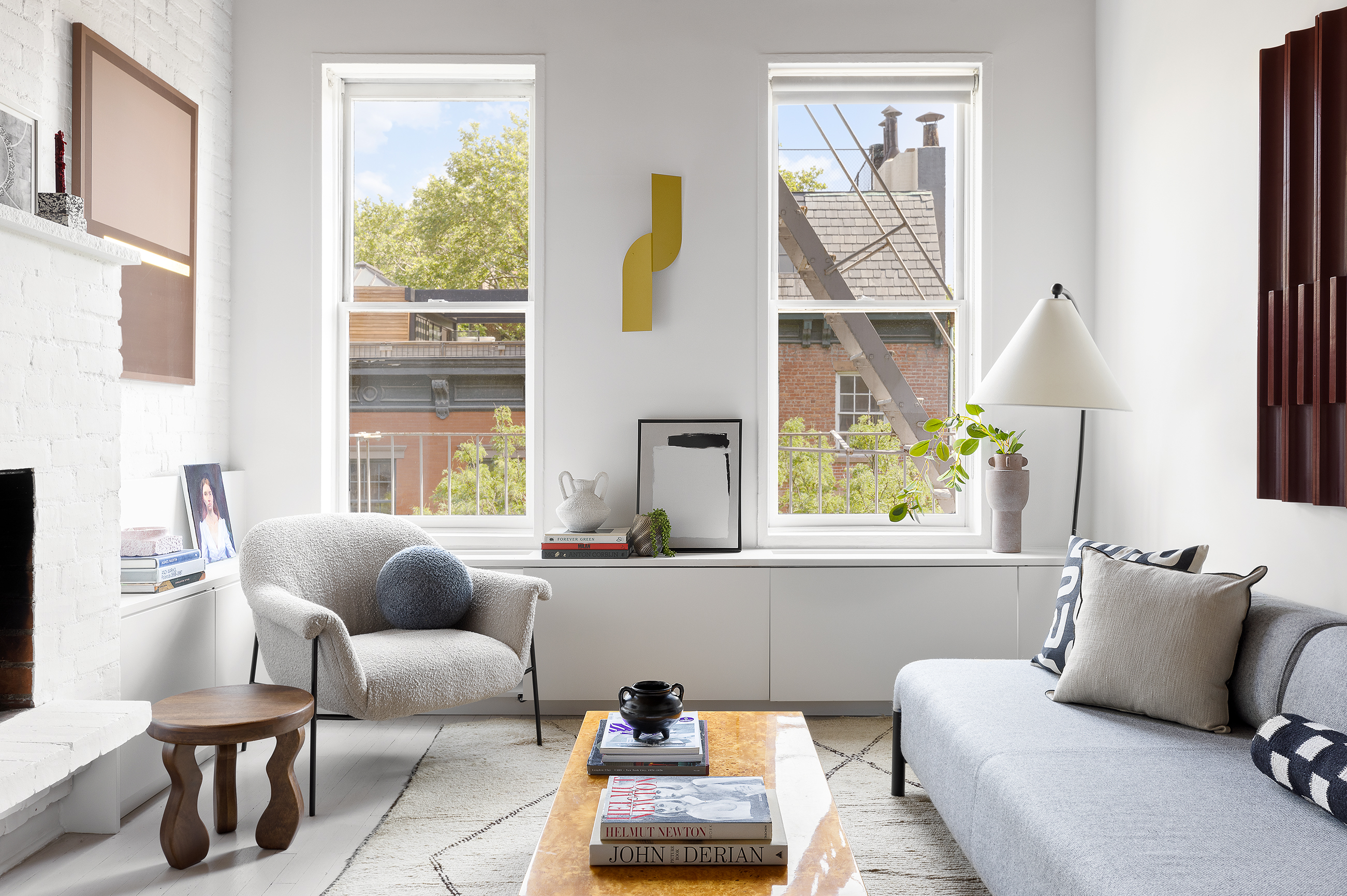 281 West 11th Street, Unit 4/5C Manhattan, NY 10014 - Photo 3 of 18 a living room with furniture and a window