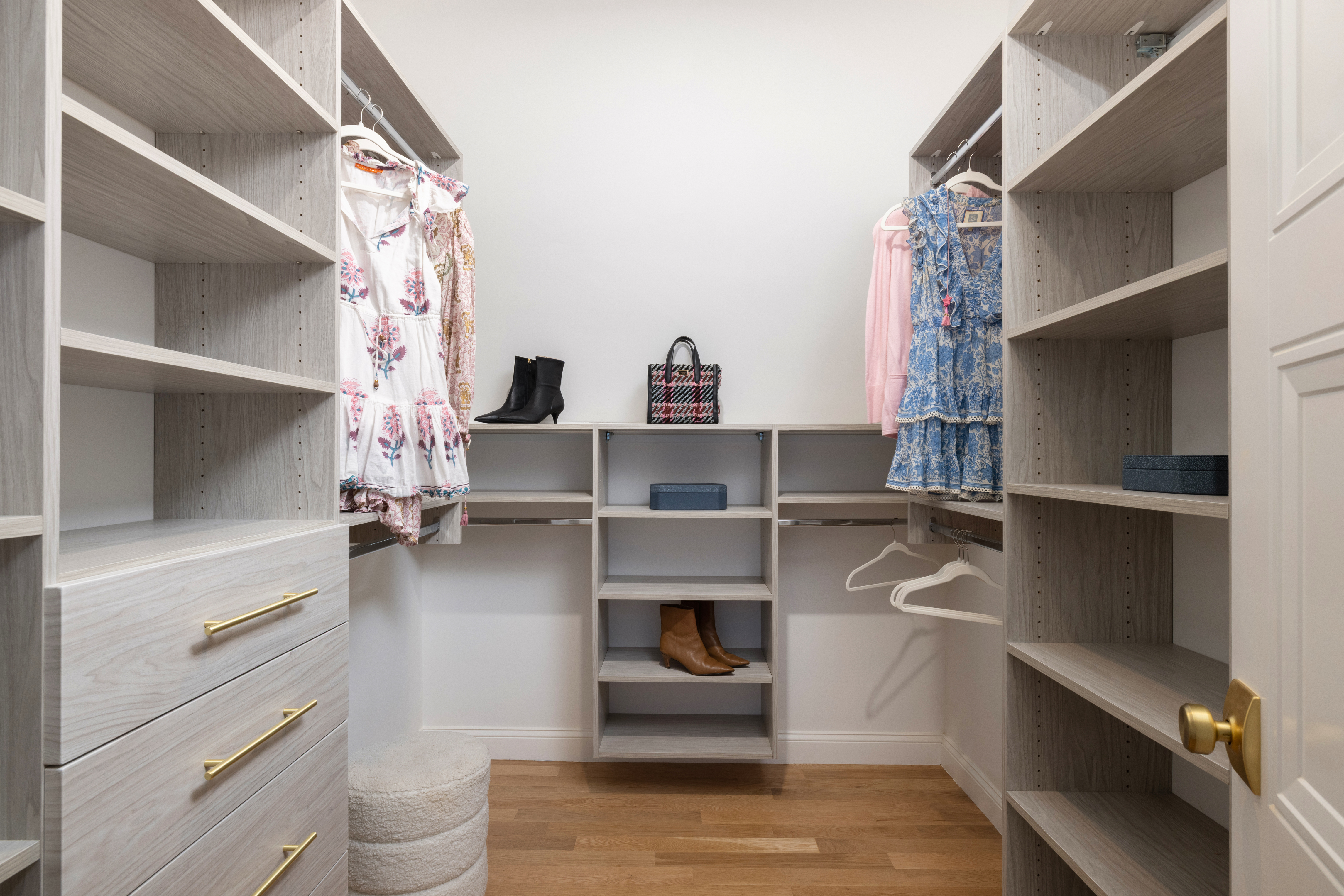 85 Naples Road, Unit 1 Brookline, MA 02446 - Photo 19 of 32 a view of walk in closet with clothes and shoes