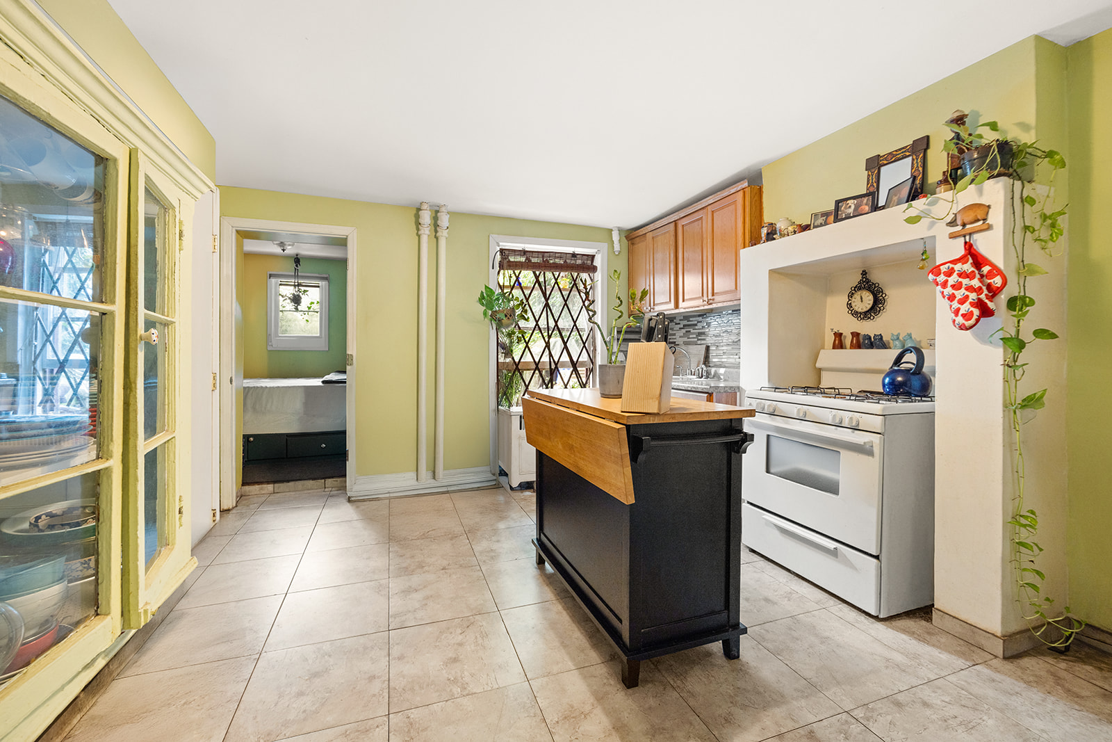 33 Park Place Brooklyn, NY 11217 - Photo 3 of 18 a kitchen with a stove and cabinets