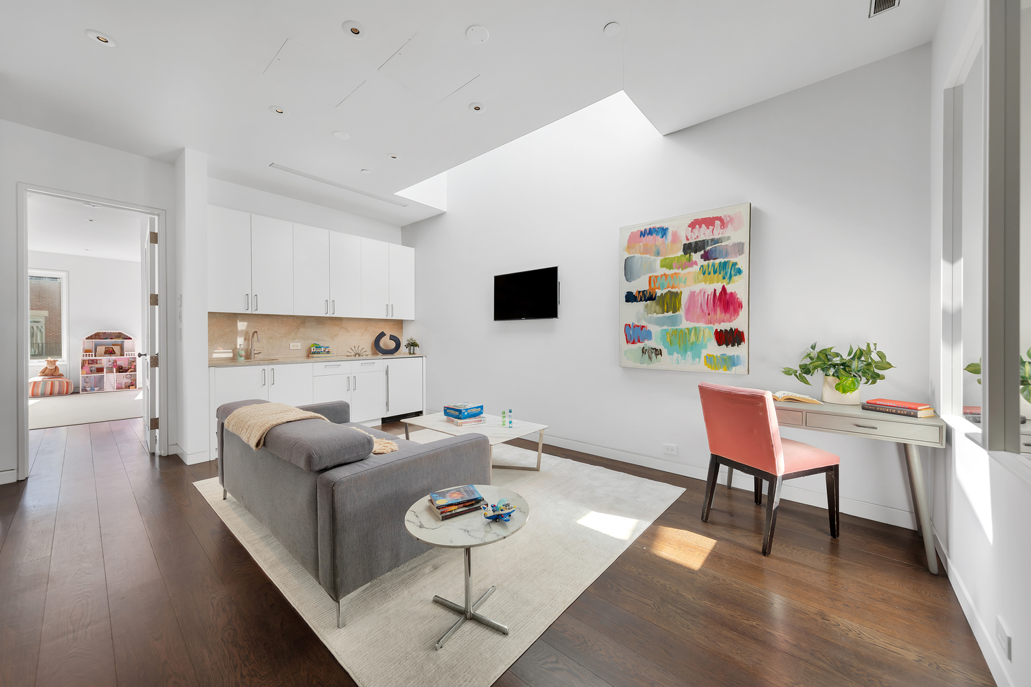 42 West 71st Street Manhattan, NY 10023 - Photo 25 of 35 a living room with furniture and a wooden floor
