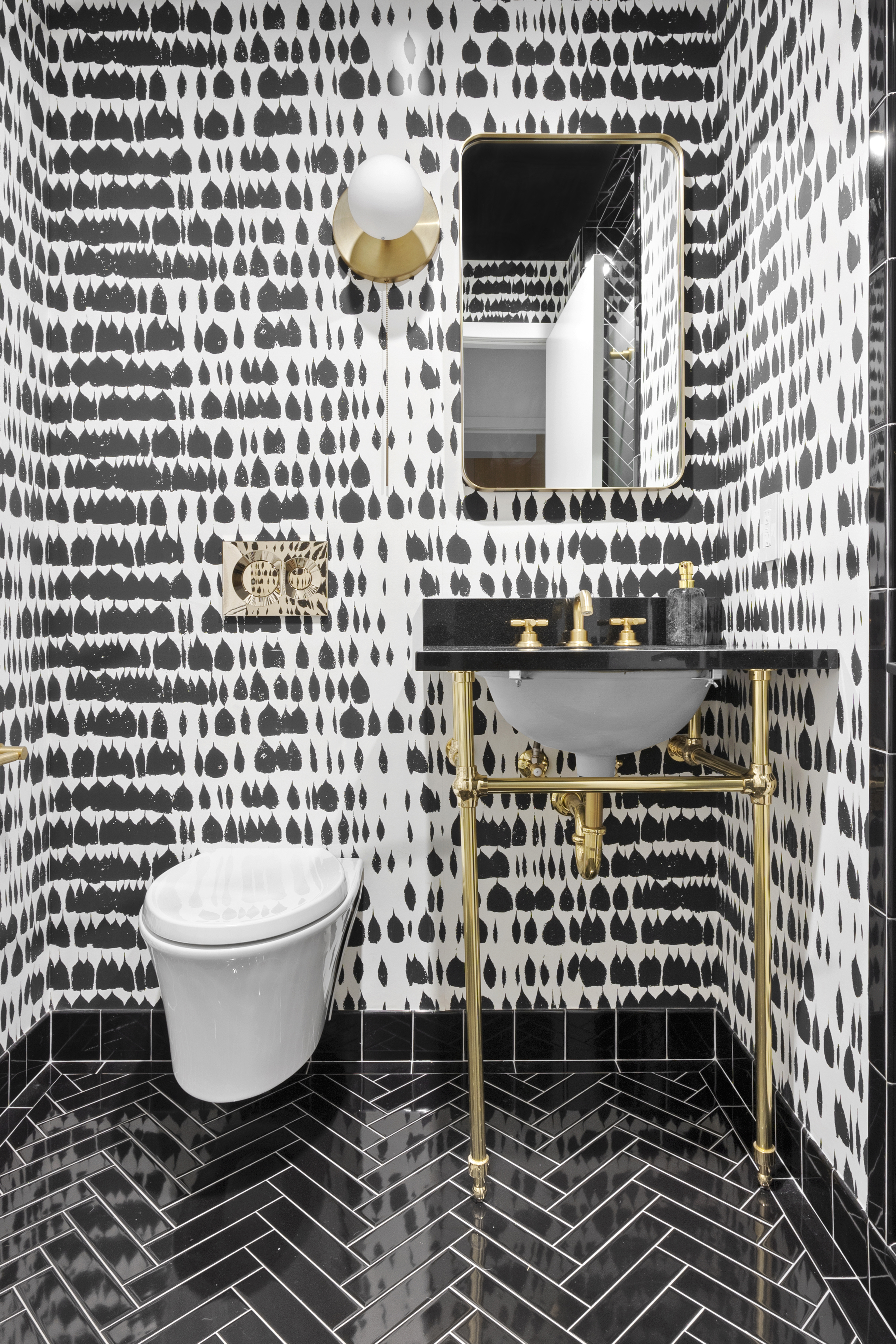 116 West 22nd Street, Unit 5 Manhattan, NY 10011 - Photo 10 of 15 a bathroom with a sink and a toilet