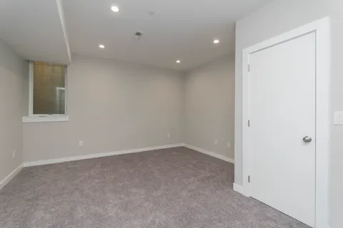 an empty room with a natural light
