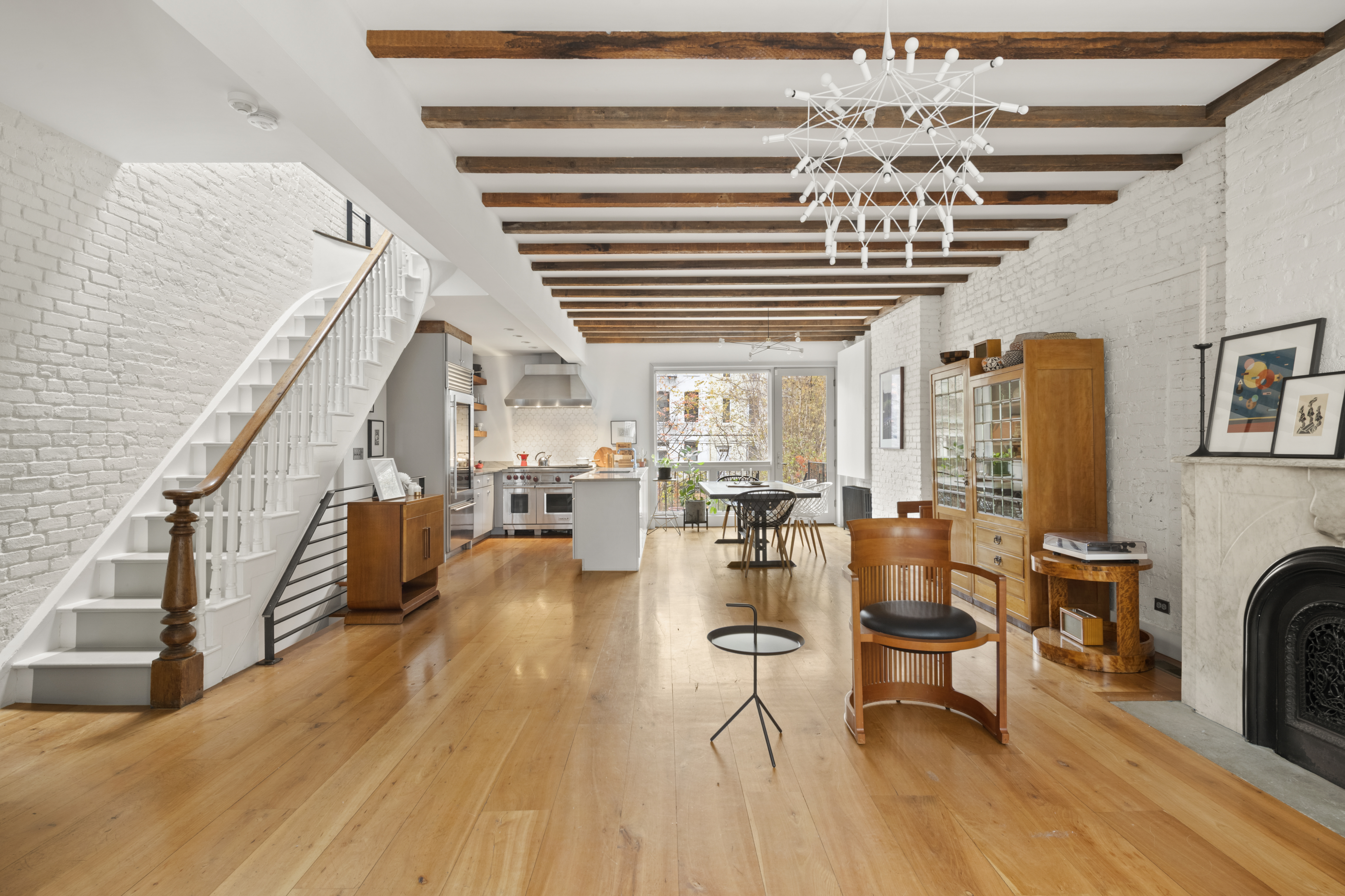 203 Huntington Street Brooklyn, NY 11231 - Photo 2 of 16 a view of a livingroom with furniture and a floor to ceiling window
