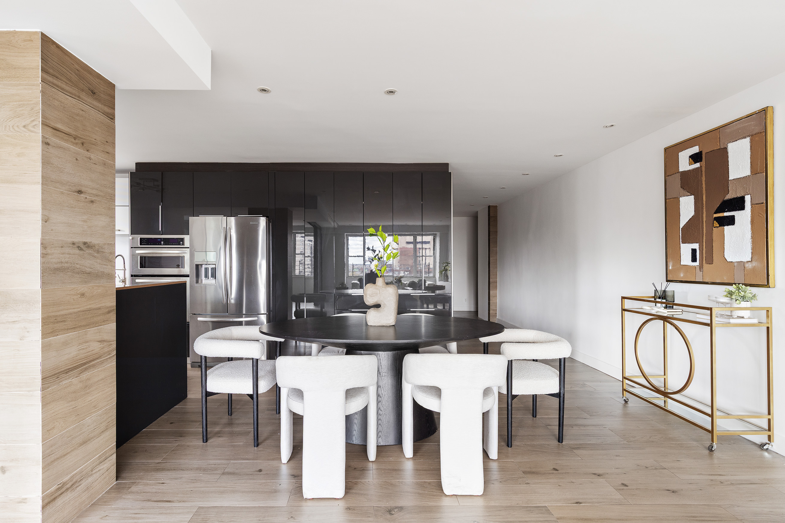 340 East 64th Street, Unit 19L Manhattan, NY 10065 - Photo 7 of 17 a view of a dining room with furniture and window