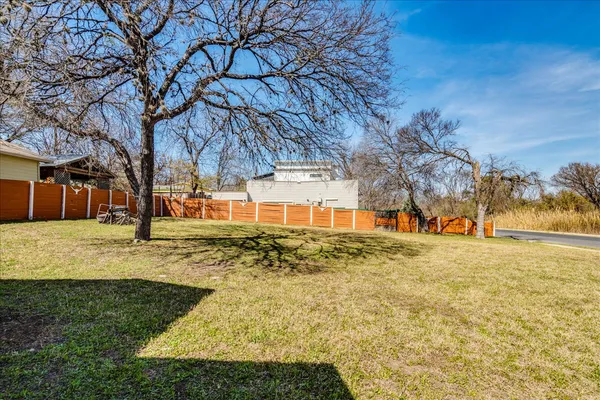 a view of a yard with an outdoor space