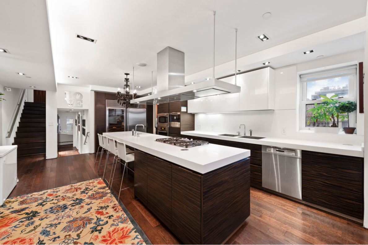 405 Broadway, Unit 4 Manhattan, NY 10013 - Photo 7 of 19 a kitchen with a sink stove and cabinets