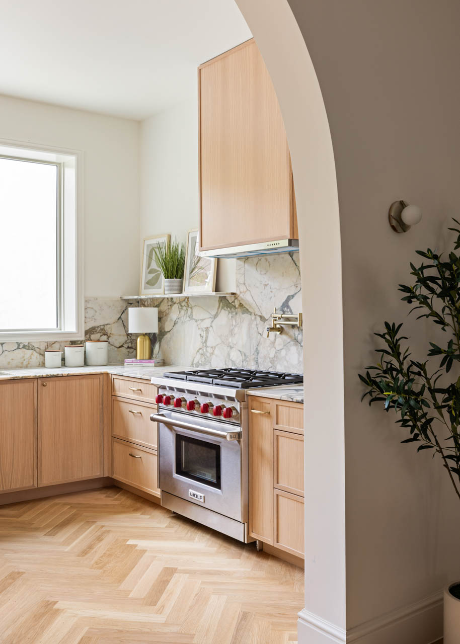 429 Decatur Street Brooklyn, NY 11233 - Photo 6 of 18 a kitchen with a stove and a potted plant