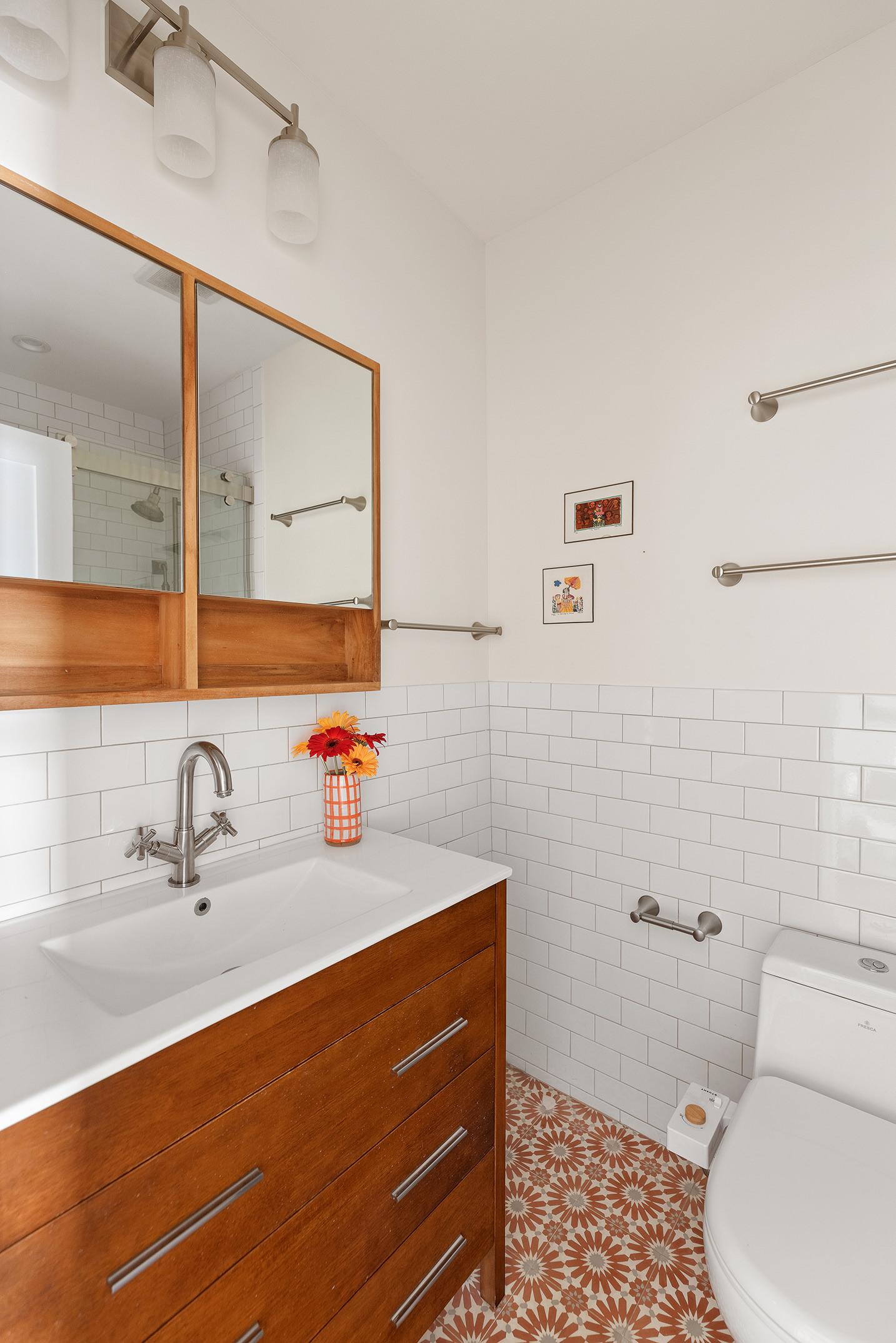 657 West 183rd Street Manhattan, NY 10033 - Photo 10 of 22 a bathroom with a sink a toilet and shower