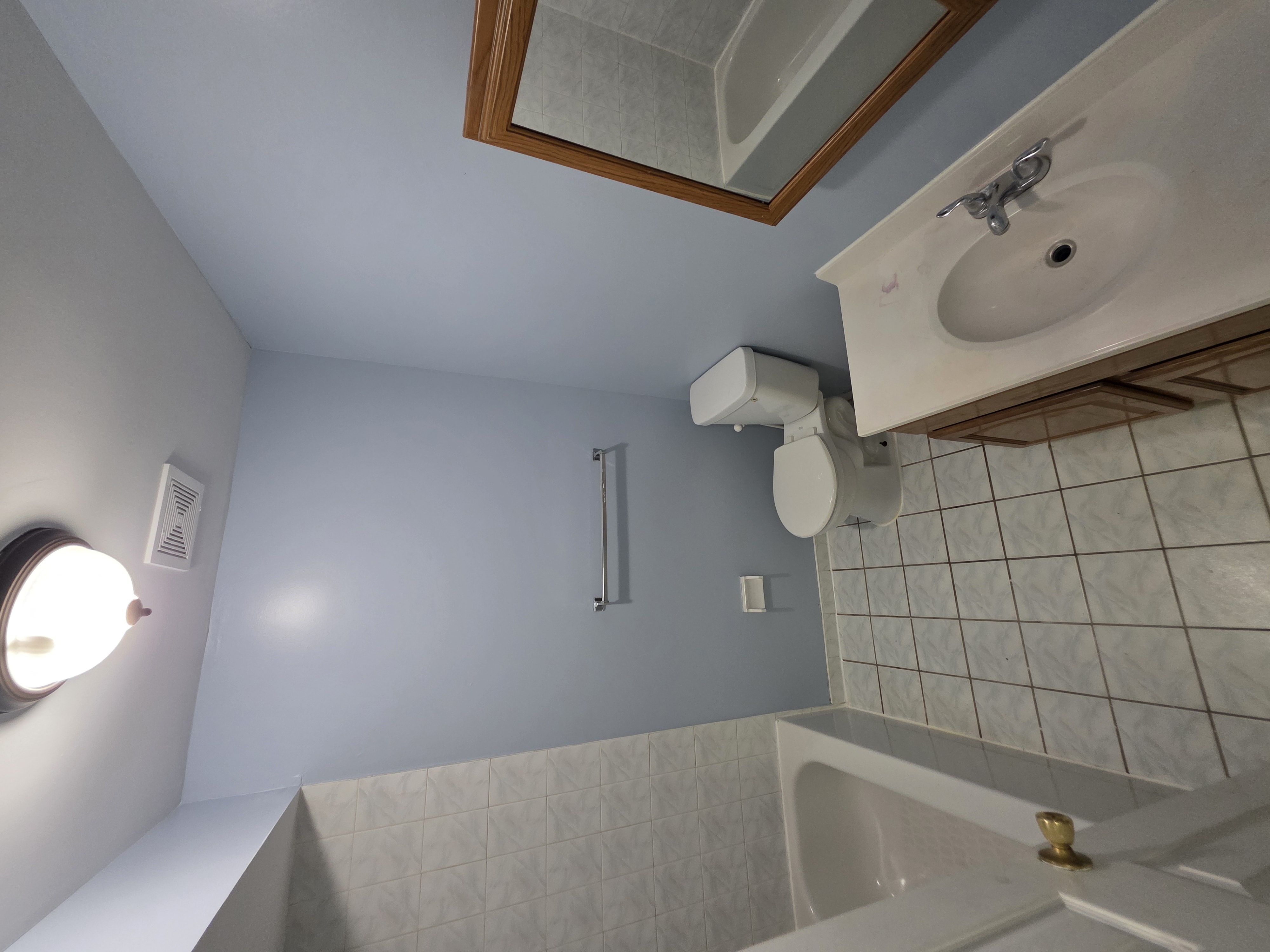 216 Pond Way, Unit 1 Staten Island, NY 10303 - Photo 8 of 9 a bathroom with a sink and toilet