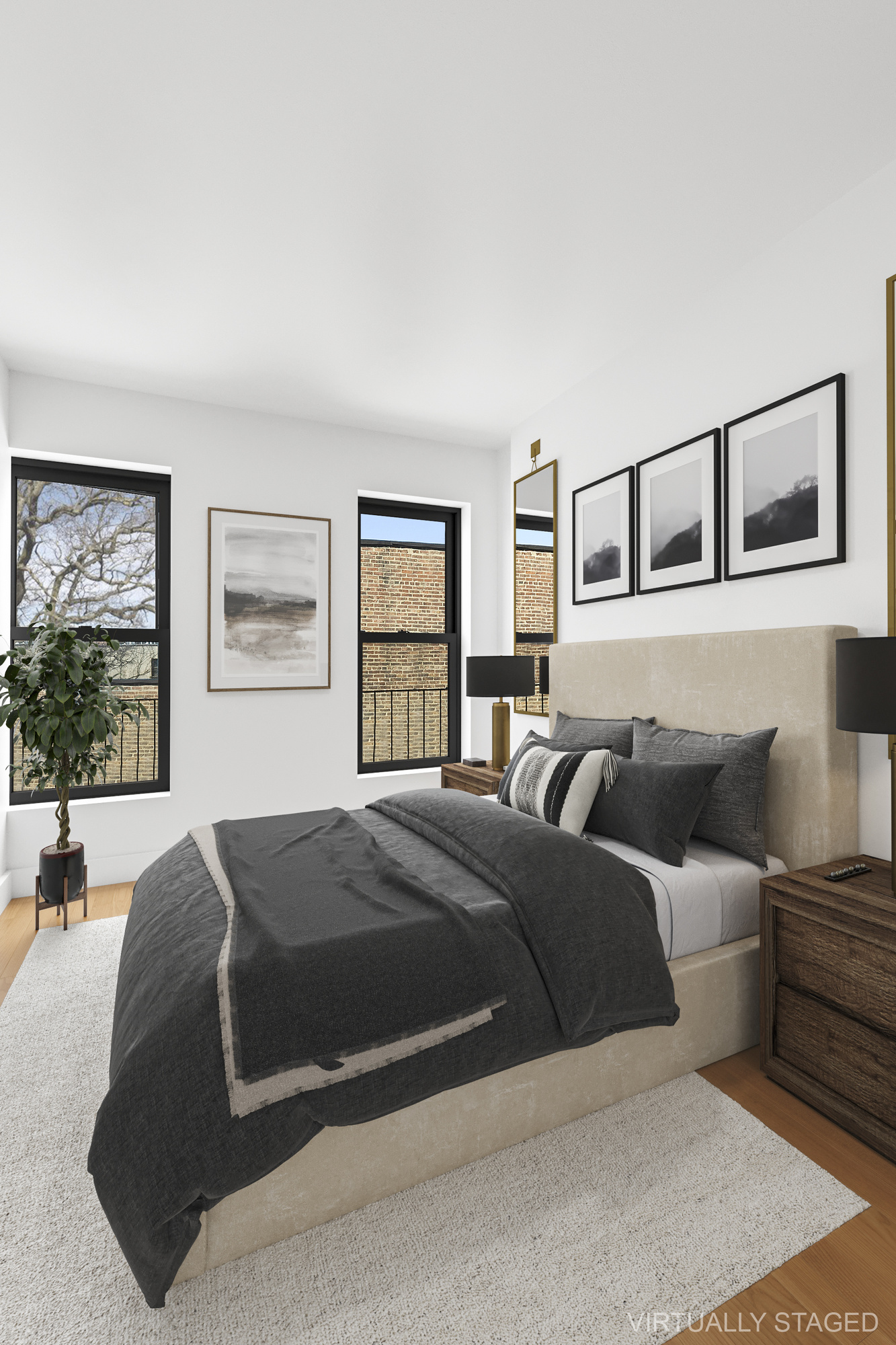 82 7th Avenue, Unit 4 Brooklyn, NY 11217 - Photo 4 of 10 a bedroom with a large bed and a couch