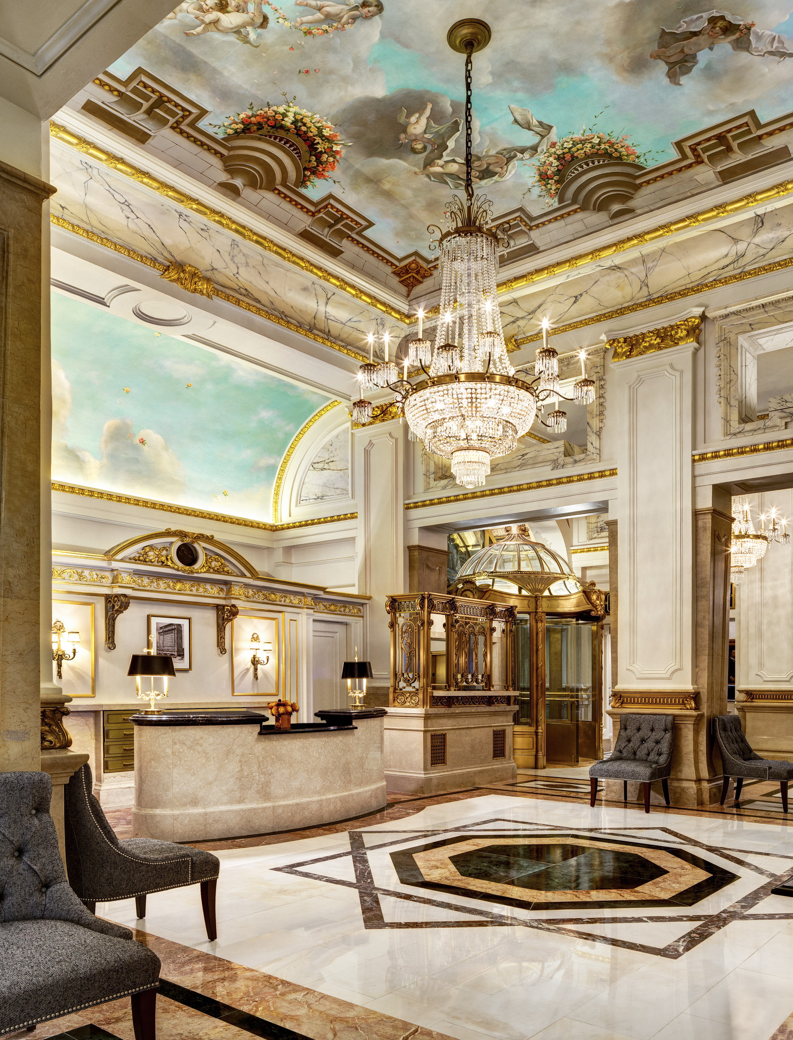 2 East 55th Street, Unit 807W4 Manhattan, NY 10022 - Photo 9 of 12 a living room with lots of furniture and chandelier