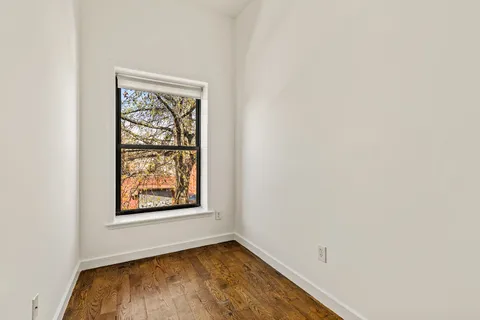 an empty room with window