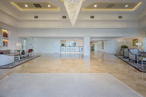 a view of livingroom with furniture and cabinet