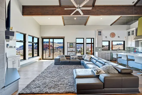 a kitchen with granite countertop a sink and a counter top space