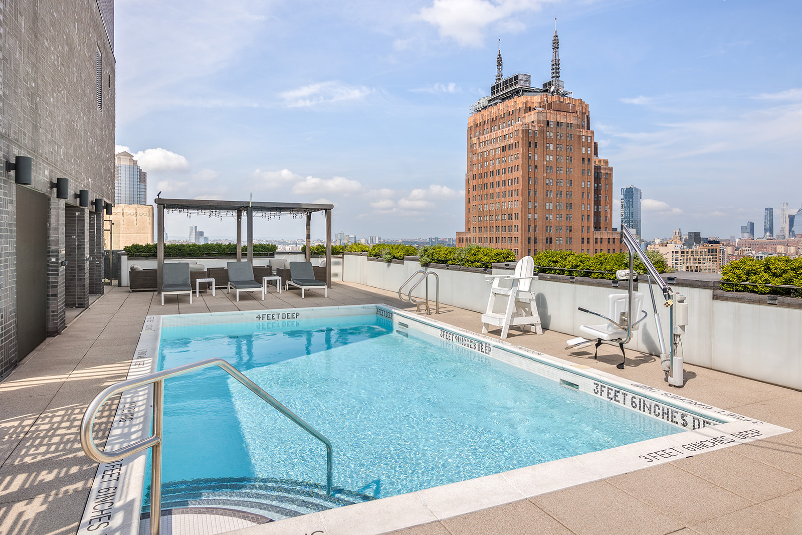 5 Franklin Place, Unit 14B Manhattan, NY 10013 - Photo 7 of 13 a view of a living room and kitchen