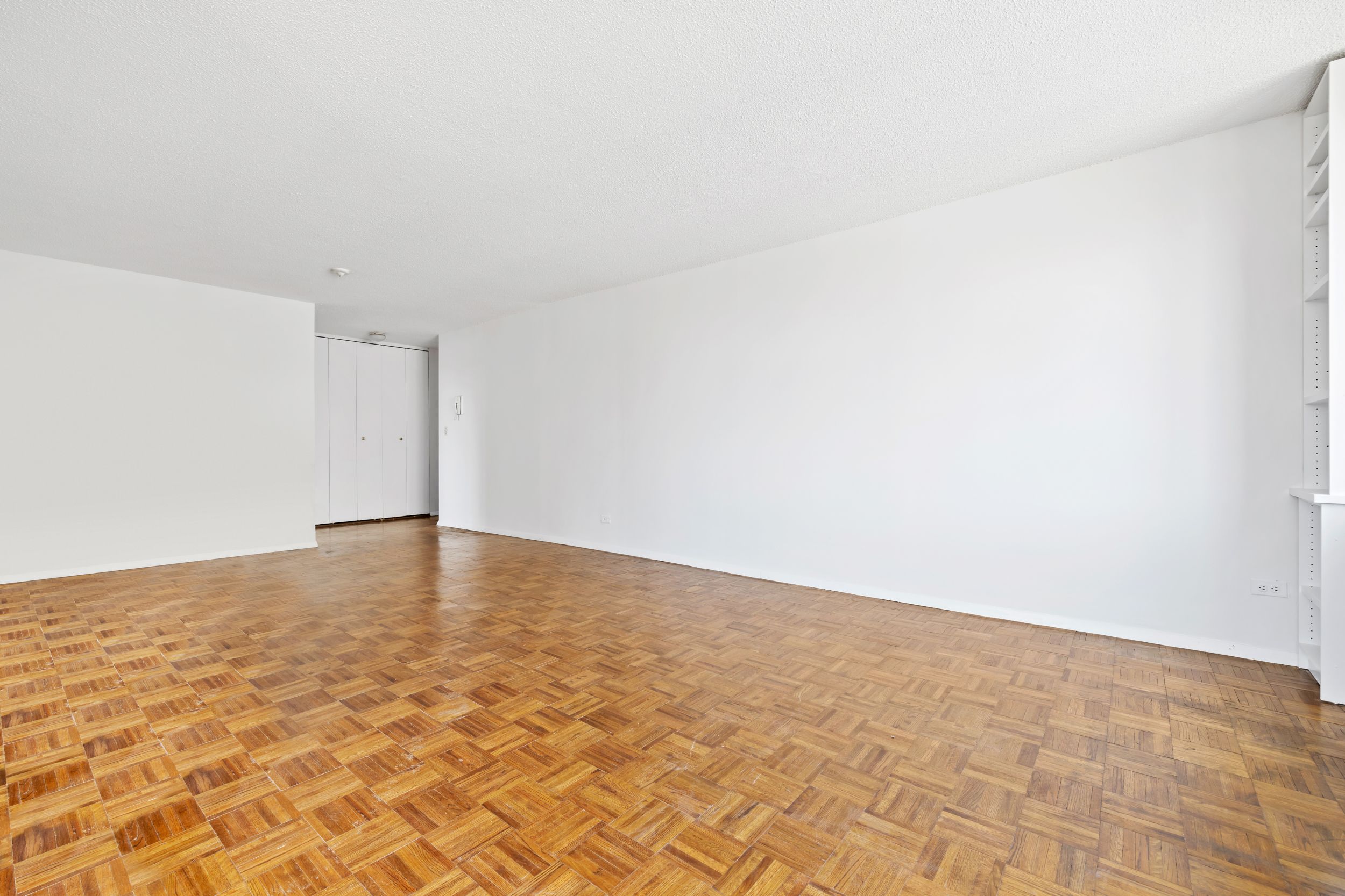 201 East 17th Street, Unit 15H Manhattan, NY 10003 - Photo 12 of 24 a view of empty room