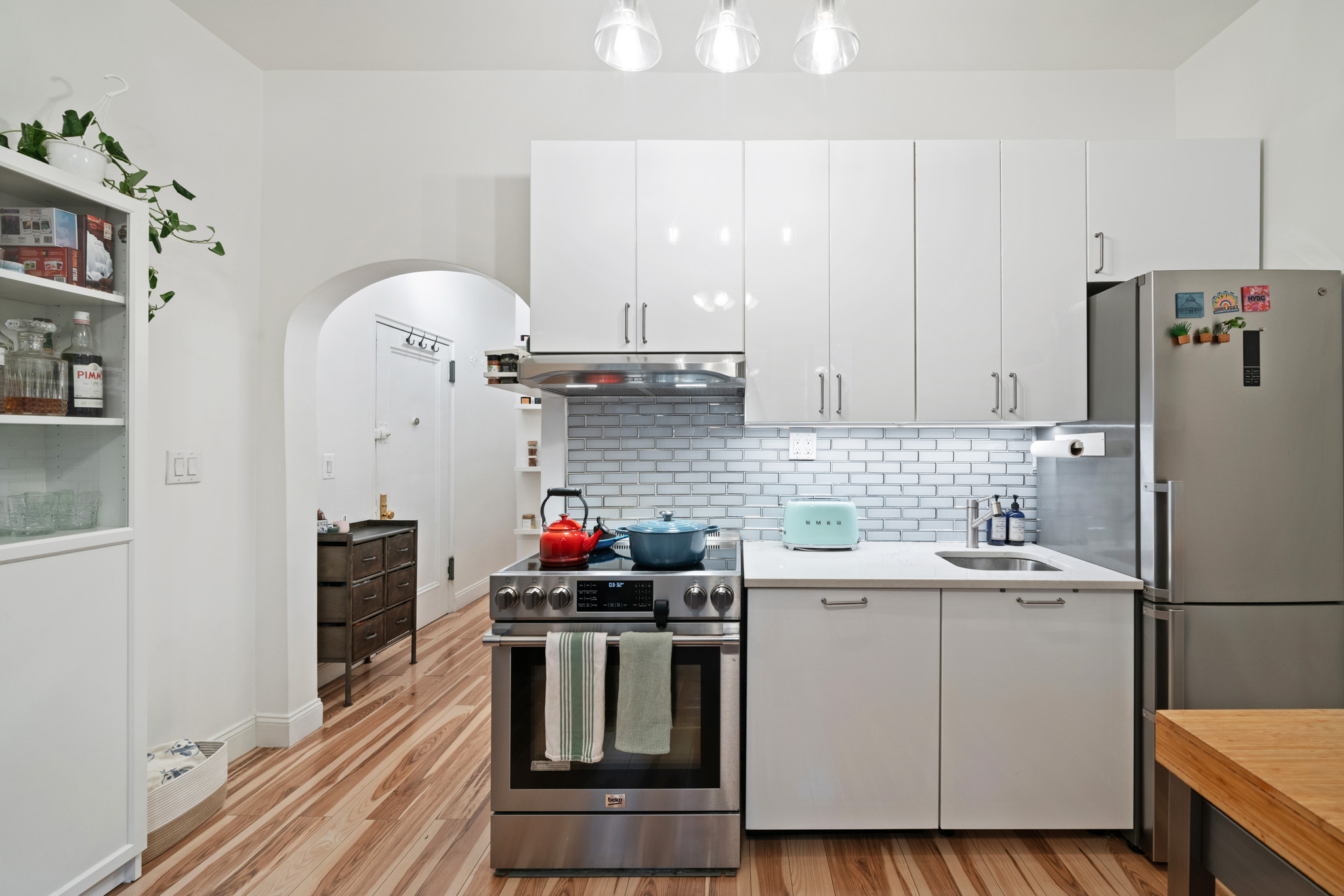 396 3rd Street, Unit 8 Brooklyn, NY 11215 - Photo 2 of 8 a kitchen with a sink cabinets and stainless steel appliances