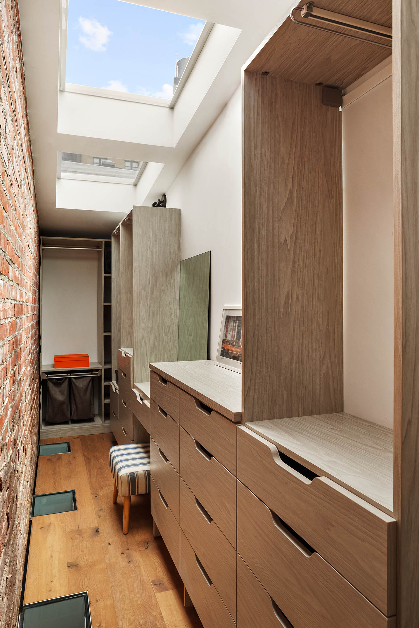 151 West 80th Street, Unit 5R Manhattan, NY 10024 - Photo 7 of 10 a hallway with a large window and furniture