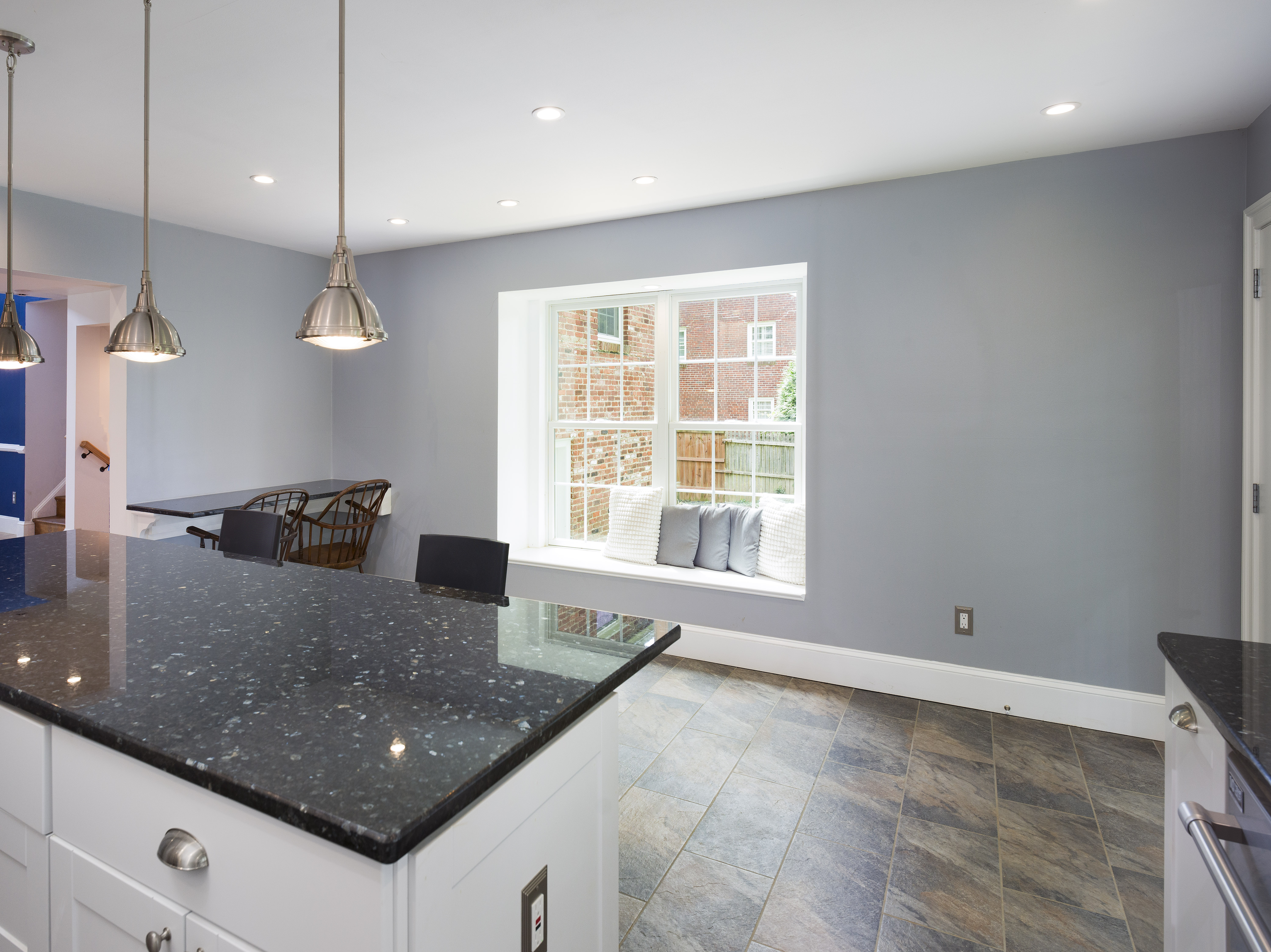 319 West Conestoga Road Devon, PA 19333 - Photo 15 of 38 a kitchen with stainless steel appliances granite countertop a sink a large window and a counter top space