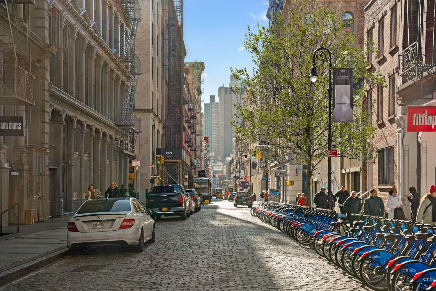 111 Mercer Street, Unit 4 Manhattan, NY 10012 - Photo 11 of 12 a view of a cars park in front of a building