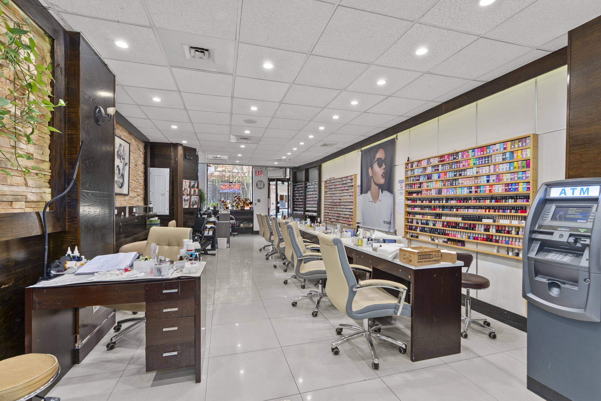 a room with lots of furniture and white appliances