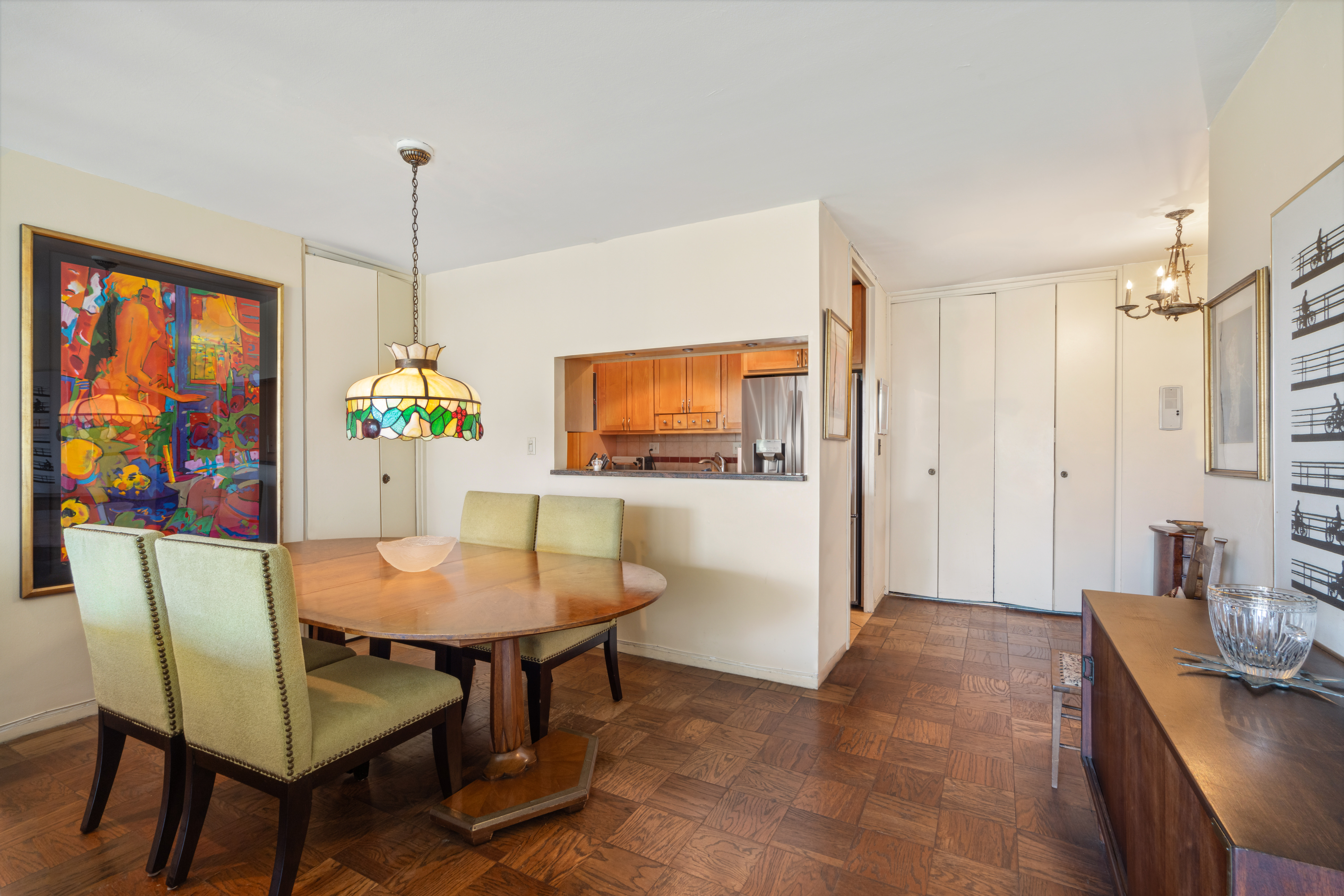 330 East 33rd Street, Unit 7C Manhattan, NY 10016 - Photo 3 of 18 a view of a dining room with furniture window and outside view