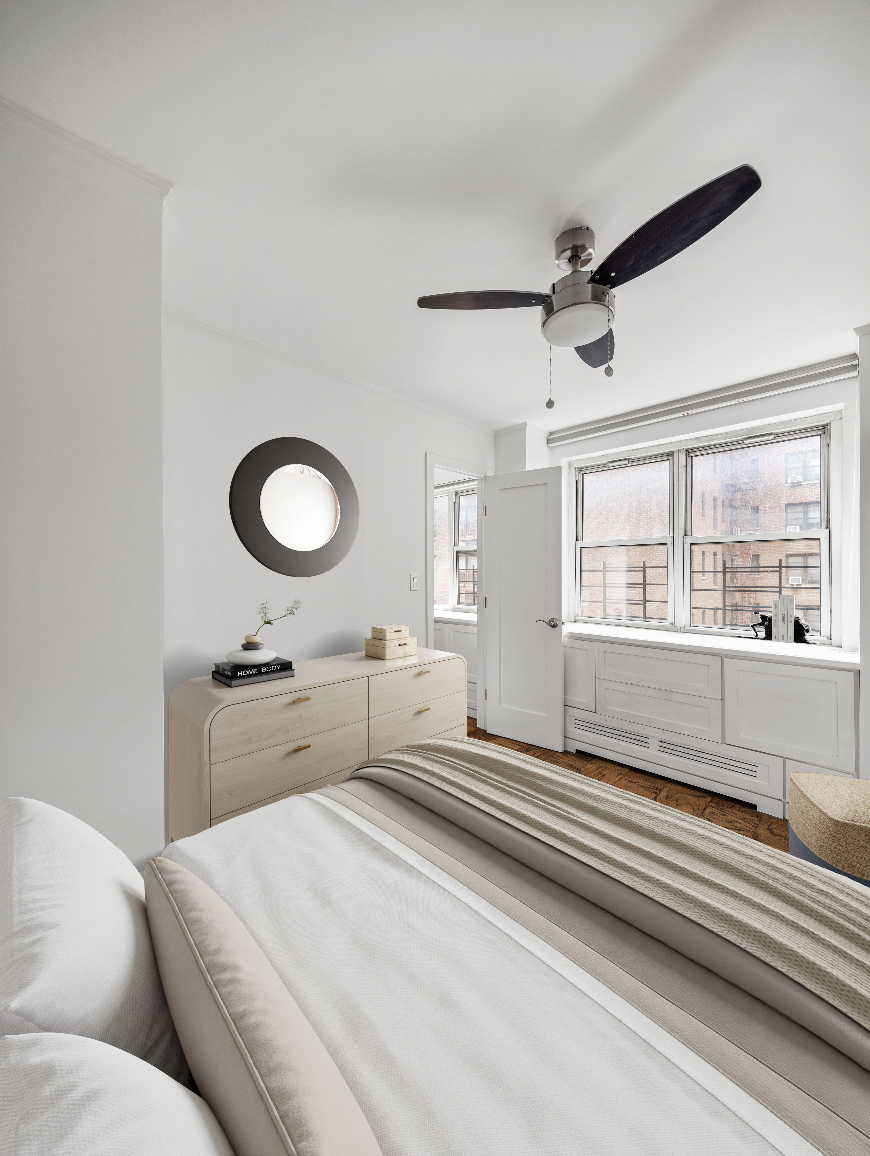 333 East 79th Street, Unit 4R Manhattan, NY 10075 - Photo 4 of 7 a living room with granite countertop furniture and a large window