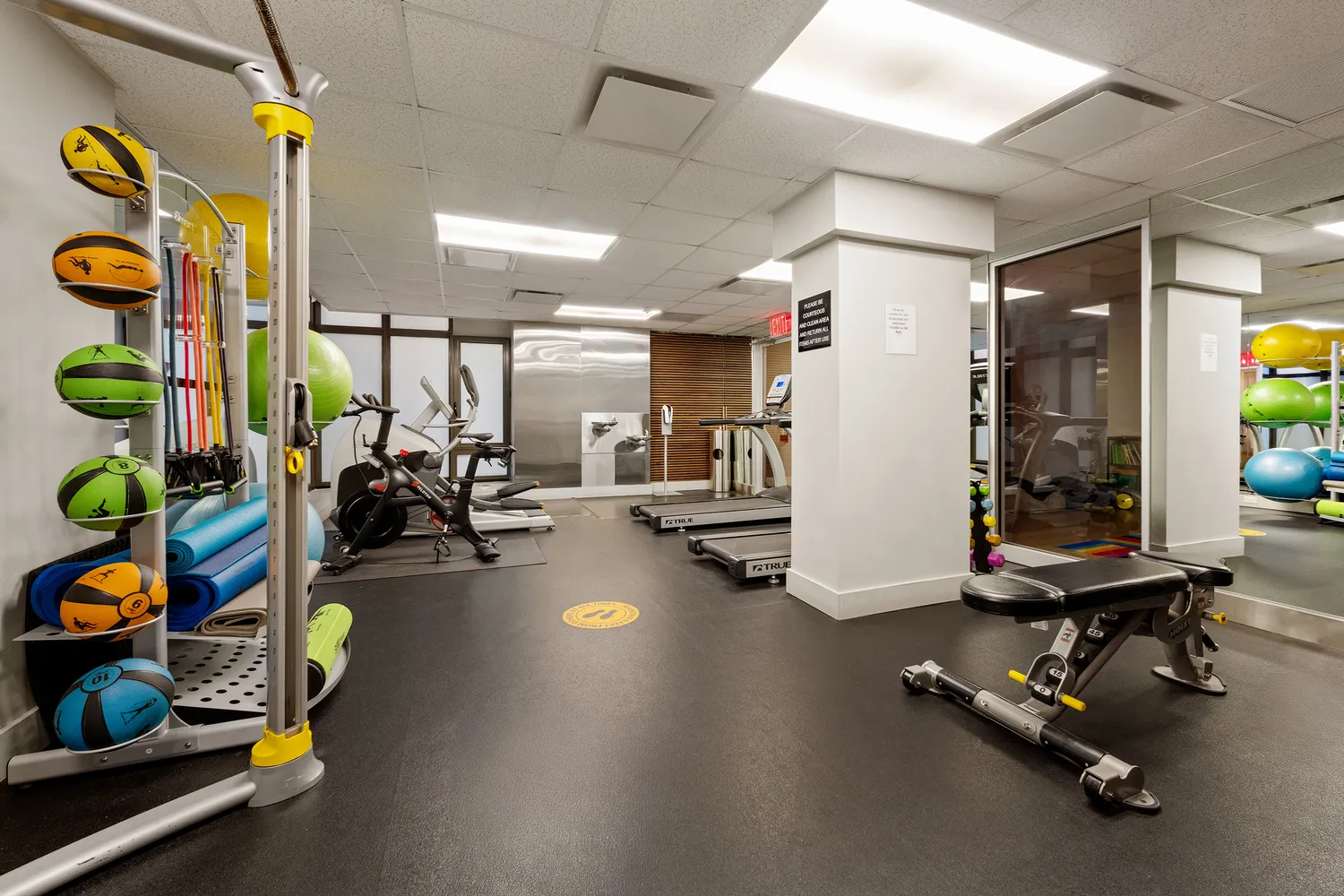 a view of a room with gym equipment