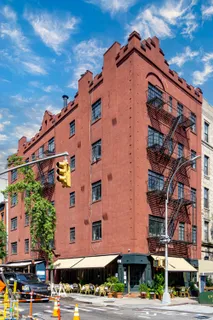 a front view of a building with street view