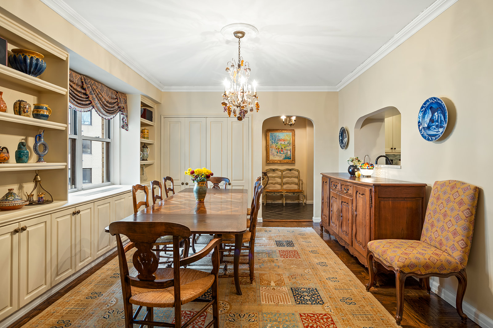200 East End Avenue, Unit 10KL Manhattan, NY 10128 - Photo 11 of 23 a dining room with furniture and window