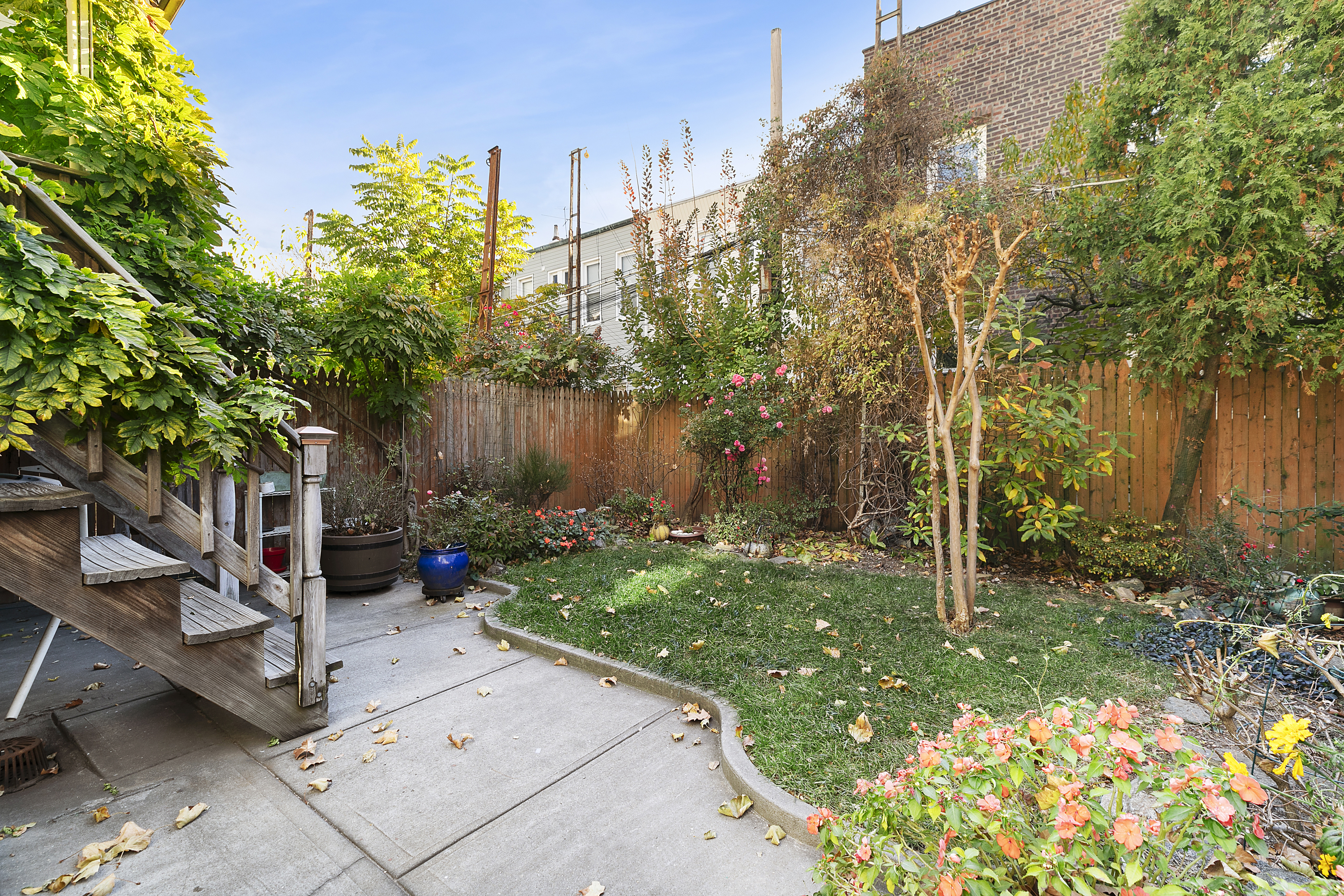 60-38 68th Road Queens, NY 11385 - Photo 10 of 14 a view of garden with patio