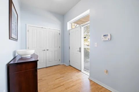 a bedroom with a bed and a table