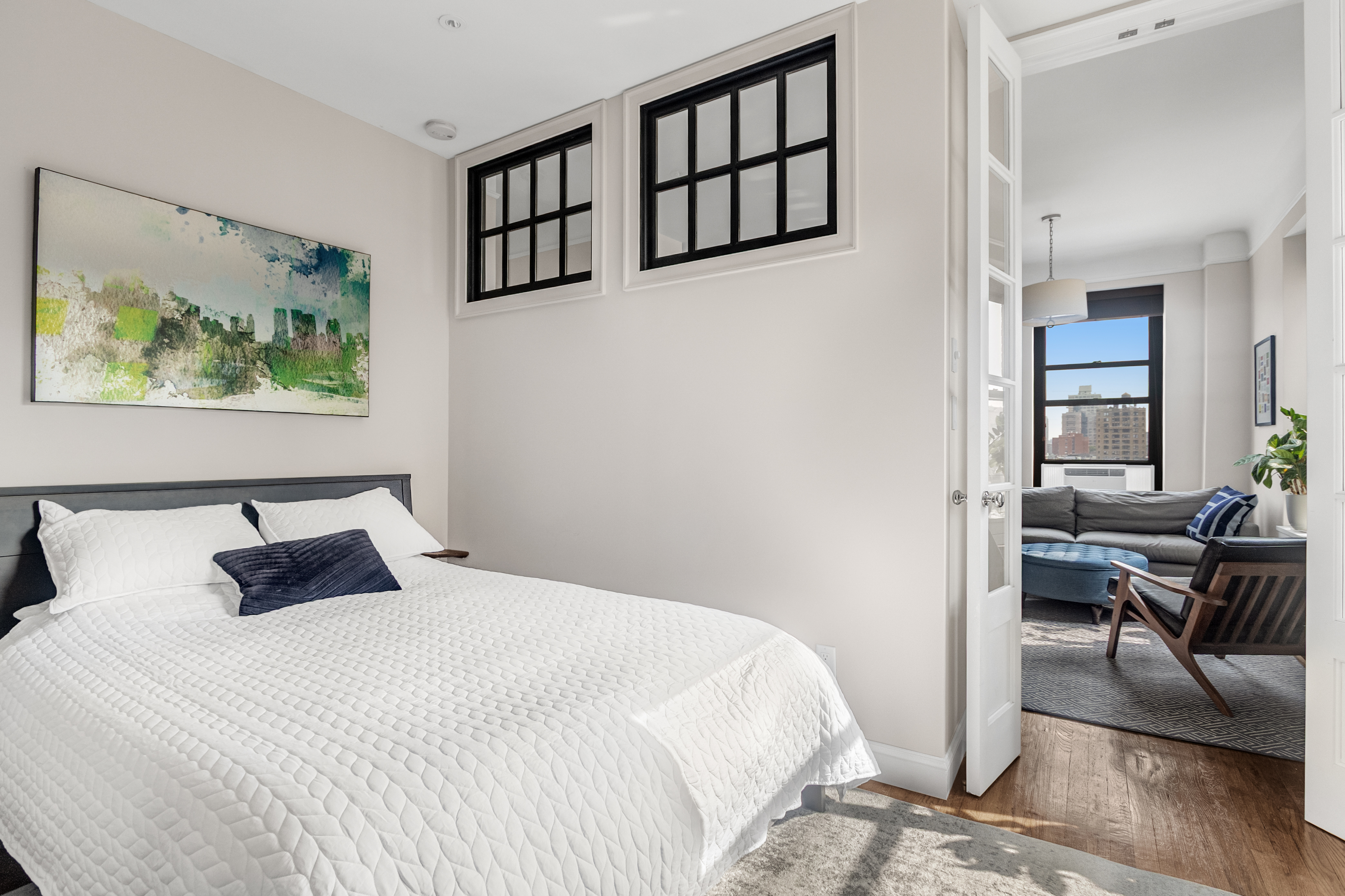 51 West 81st Street, Unit 9D Manhattan, NY 10024 - Photo 7 of 15 a bedroom with a bed and a workspace