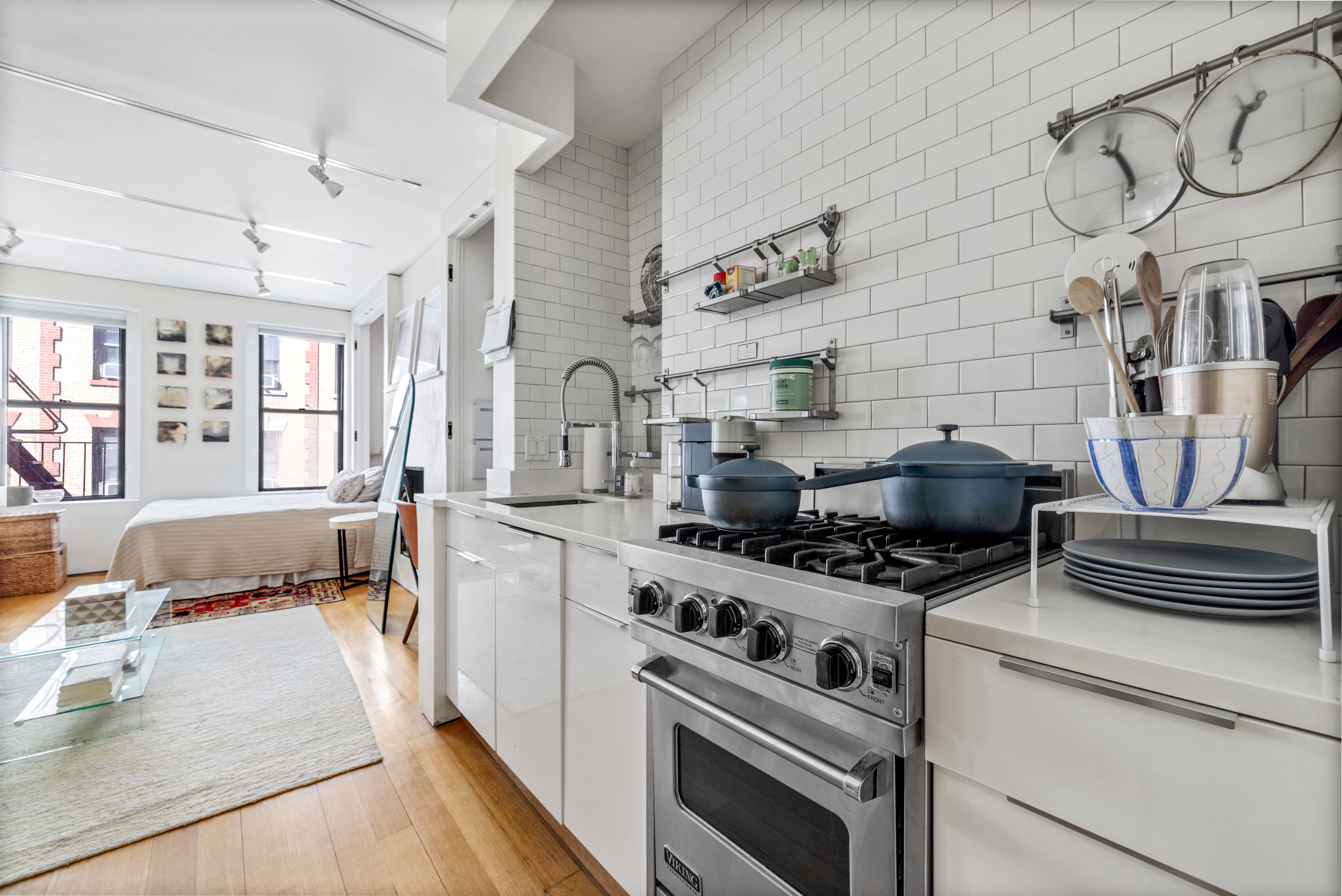 26 Cornelia Street, Unit 12 Manhattan, NY 10014 - Photo 3 of 7 a kitchen with a stove and a sink