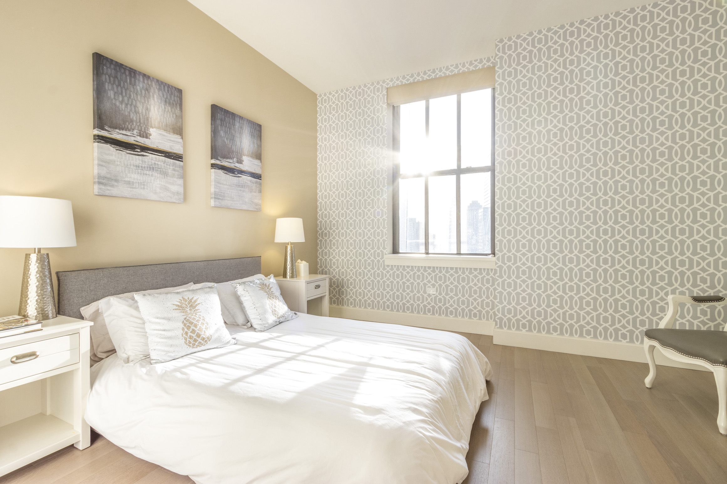 100 Barclay Street, Unit 15P Manhattan, NY 10007 - Photo 13 of 34 a bedroom with a bed and a window