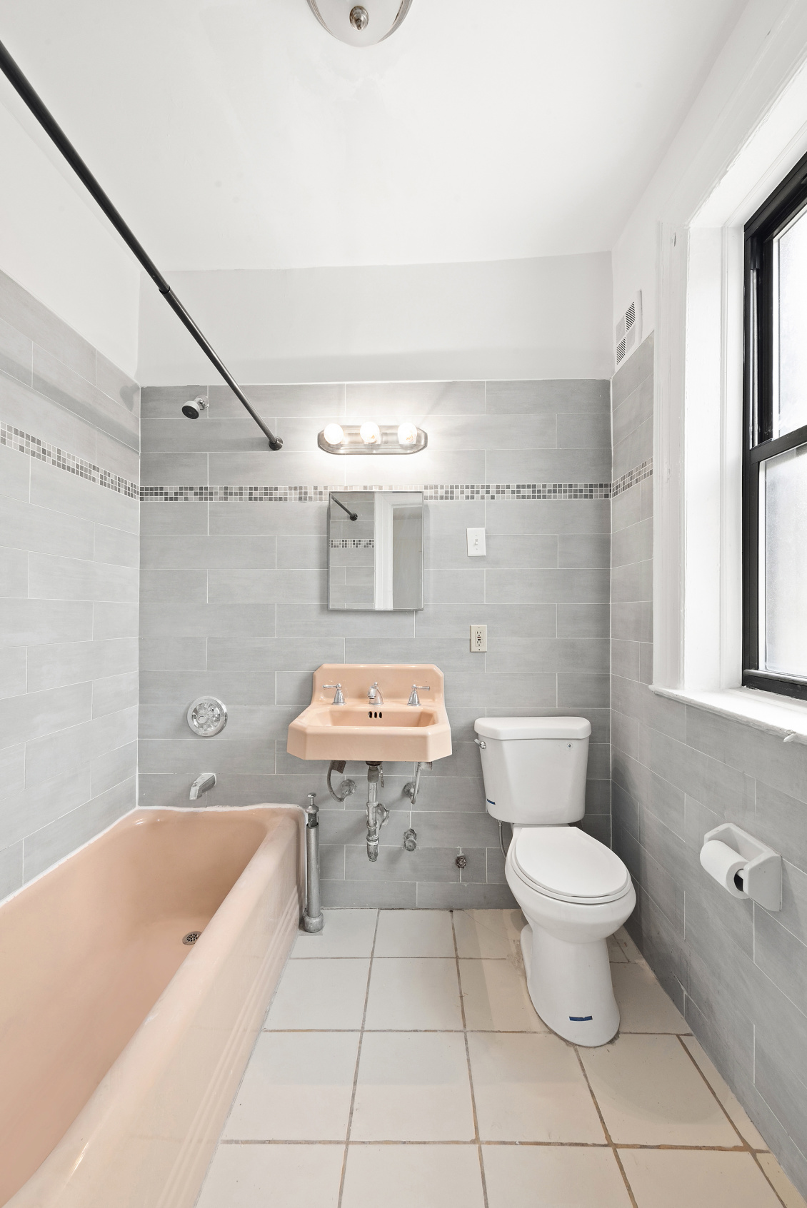 357 Sterling Place, Unit C1 Brooklyn, NY 11238 - Photo 5 of 8 a bathroom with a sink a toilet and shower